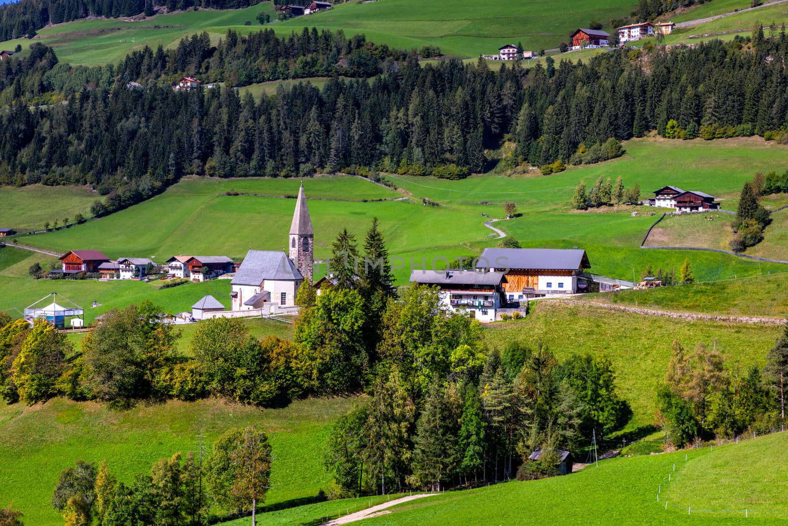 Santa Maddalena (Santa Magdalena) village with magical Dolomites mountains in background, Val di Funes valley, Trentino Alto Adige region, South Tyrol, Italy, Europe. Santa Maddalena Village, Italy. 
