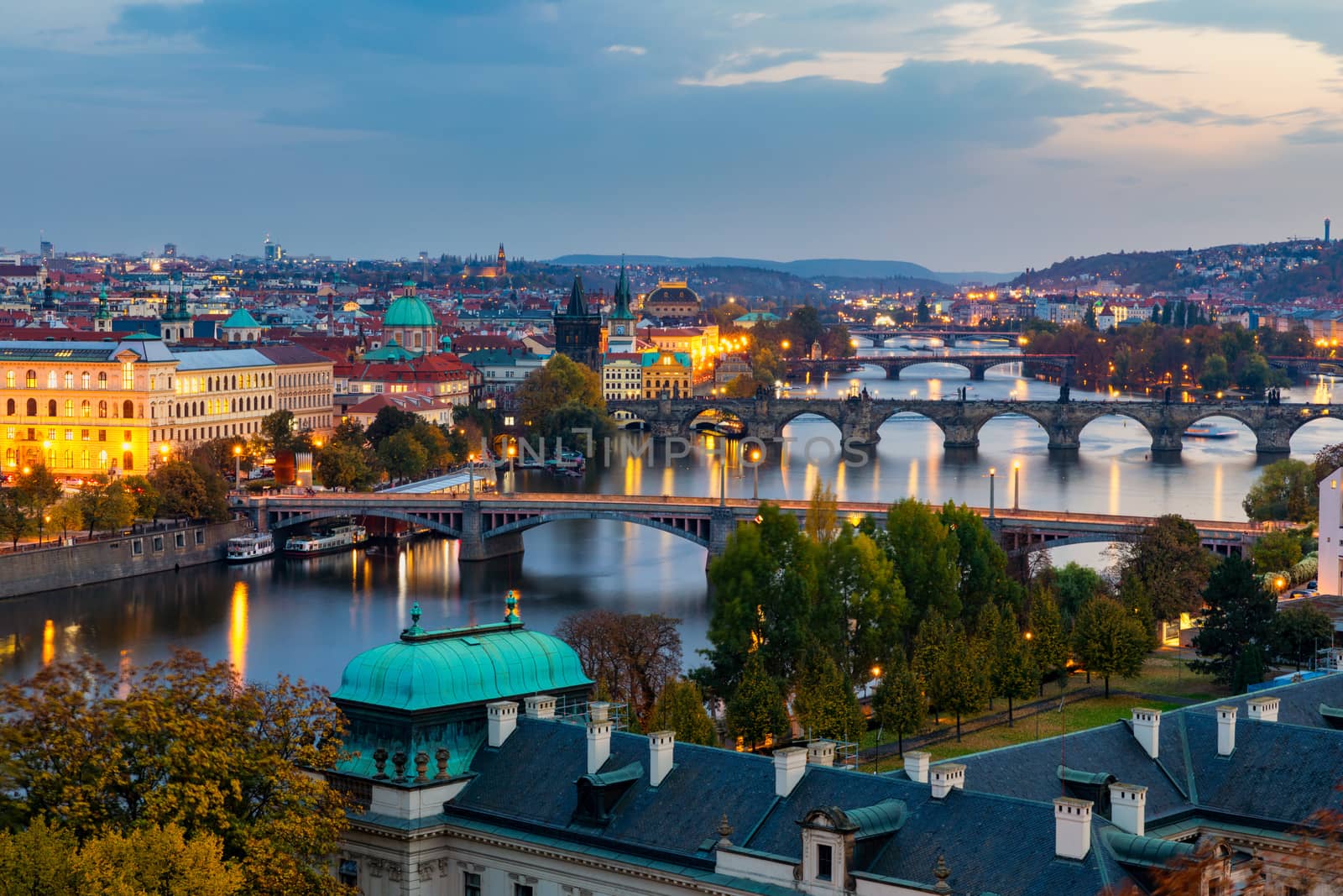 Charles Bridge in Prague in Czechia. Prague, Czech Republic. Charles Bridge (Karluv Most) and Old Town Tower. Vltava River and Charles Bridge. Concept of world travel, sightseeing and tourism.