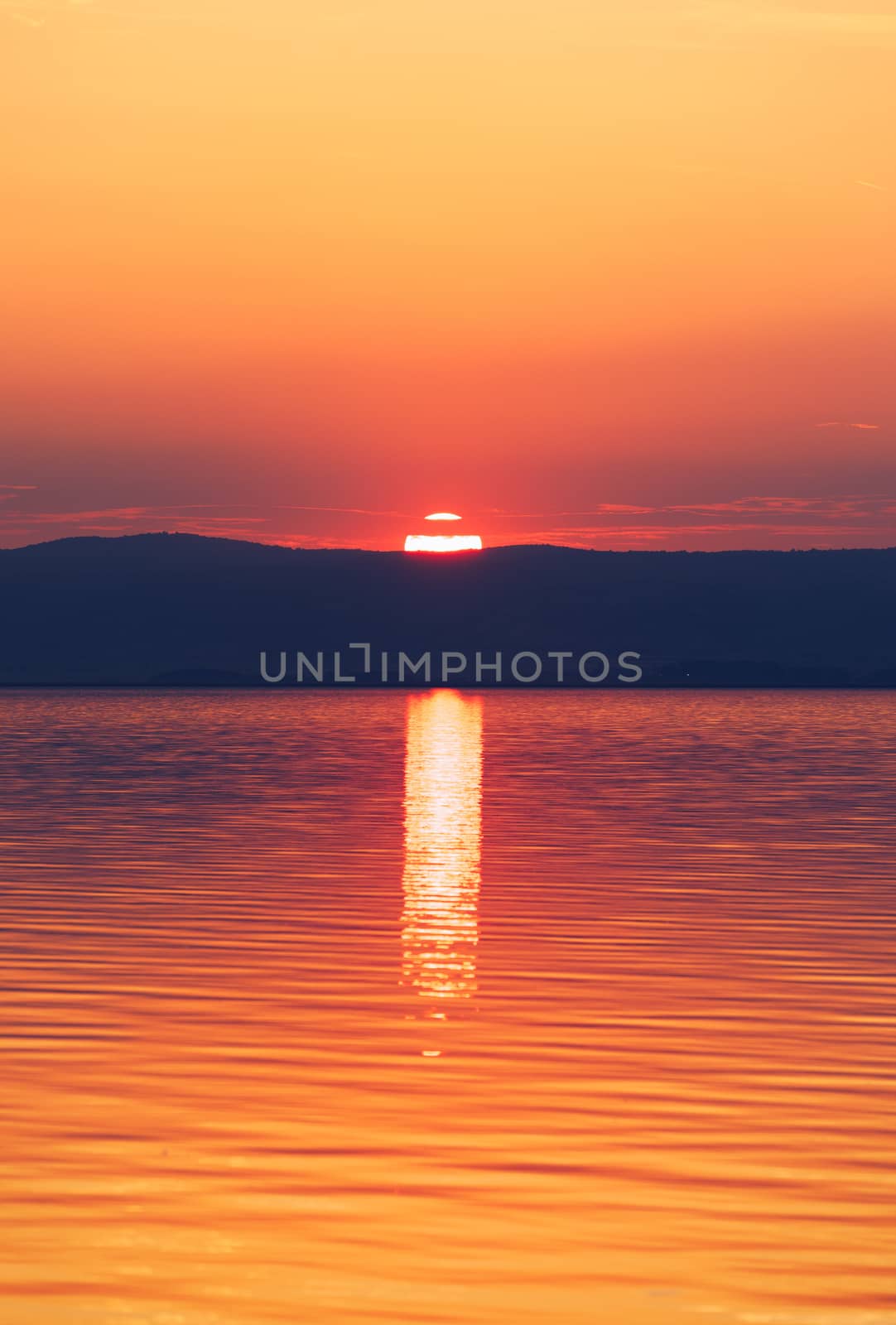 Beautiful sunset or sunrise above the sea. Tropical sunset or sunrise over sea. Colourful sunset or sunrise over water.