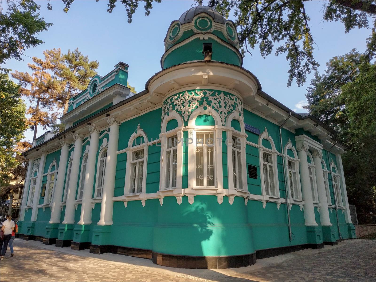 Almaty, Kazakhstan - August 28, 2019: Old merchant's house with stucco floral ornaments, was built in the early 20th century by order of Titus Golovizin - Verny master shoemakers.