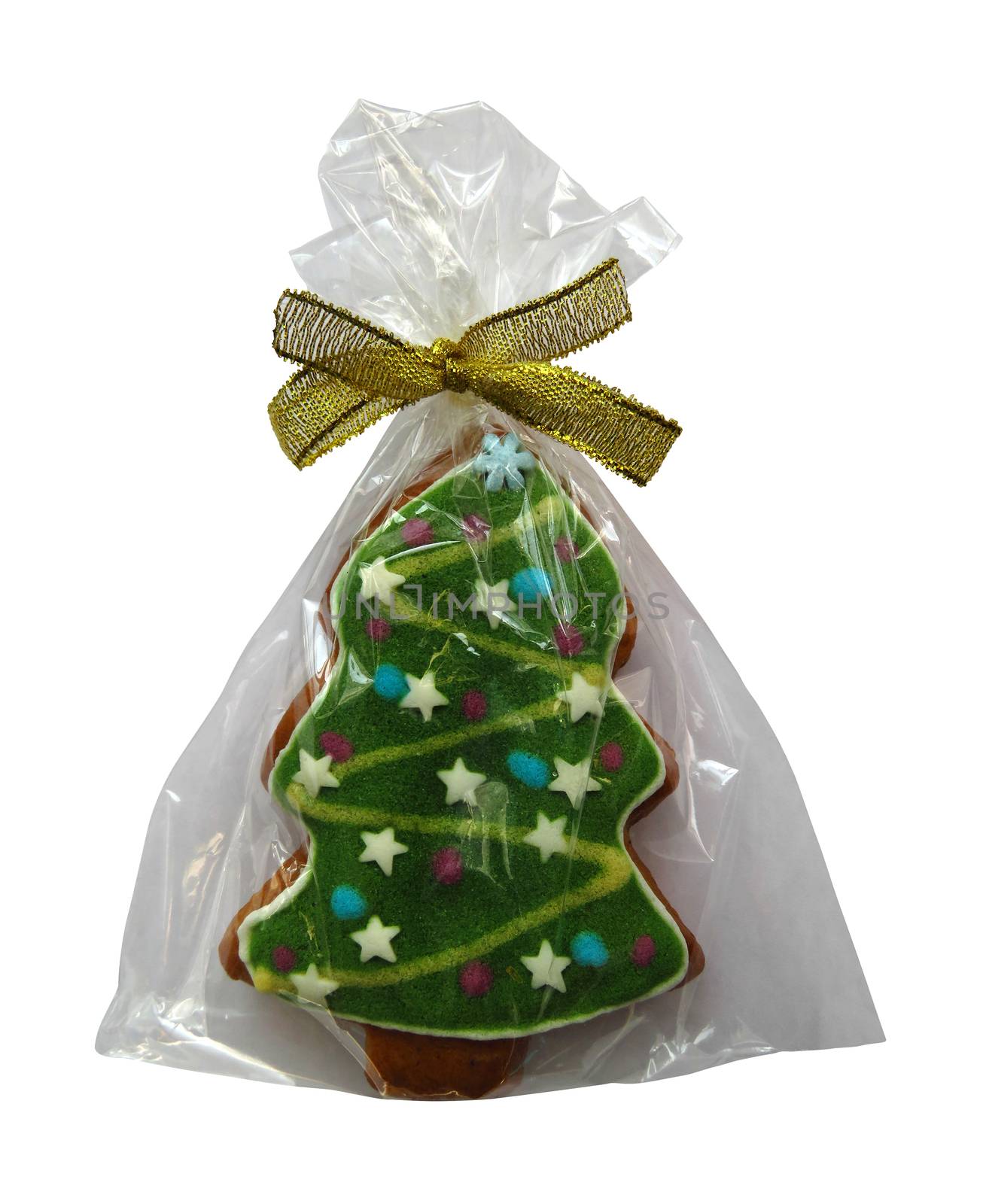 Homemade cookie in a shape of a christmas tree isolated on white with clipping path.