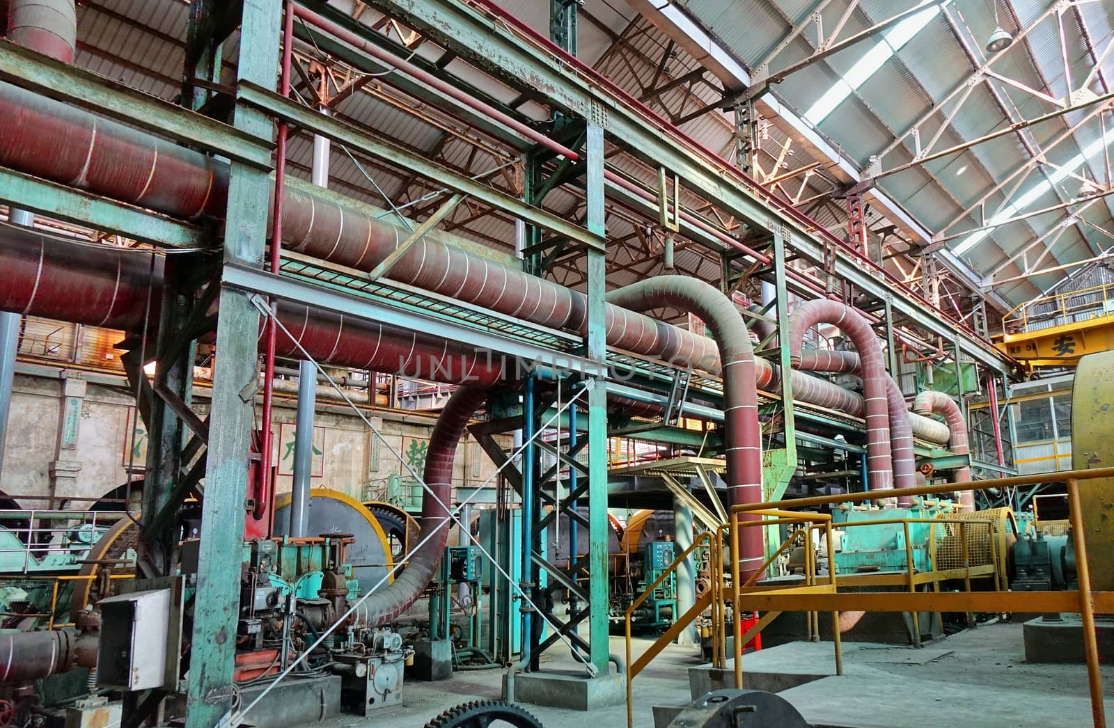 KAOHSIUNG, TAIWAN -- AUGUST 19, 2017: Abandoned vintage equipment and machinery in the former Chiaotou Sugar Refinery.