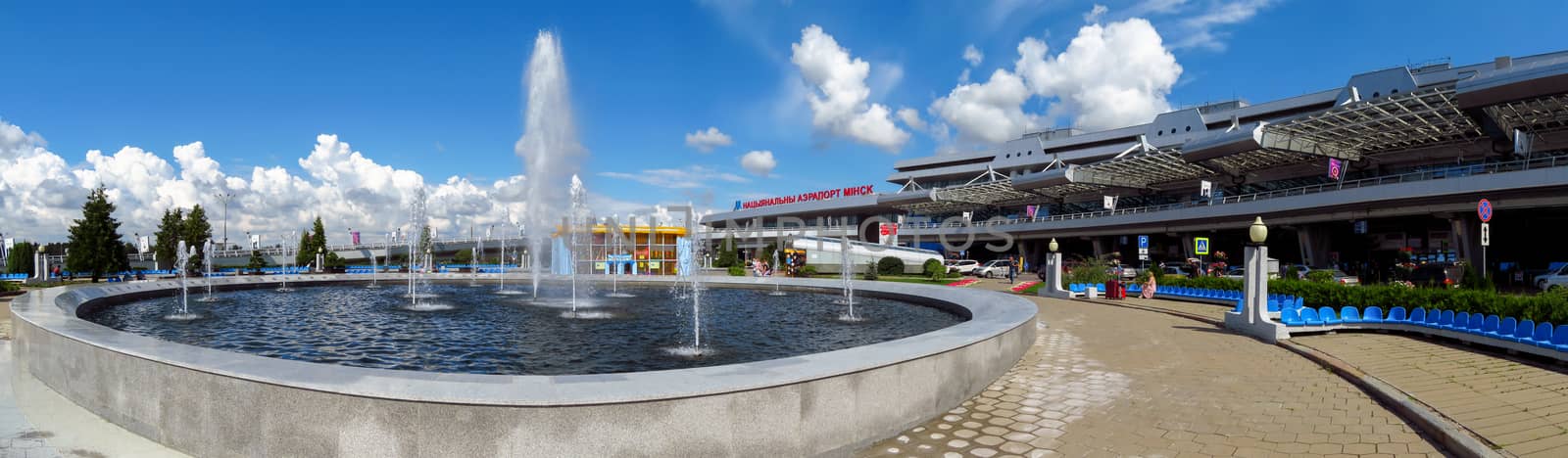 Minsk, Belarus - July 14, 2018: Wide angle view of National Airport. It is the main international airport in Belarus. Some people are walking near airport.