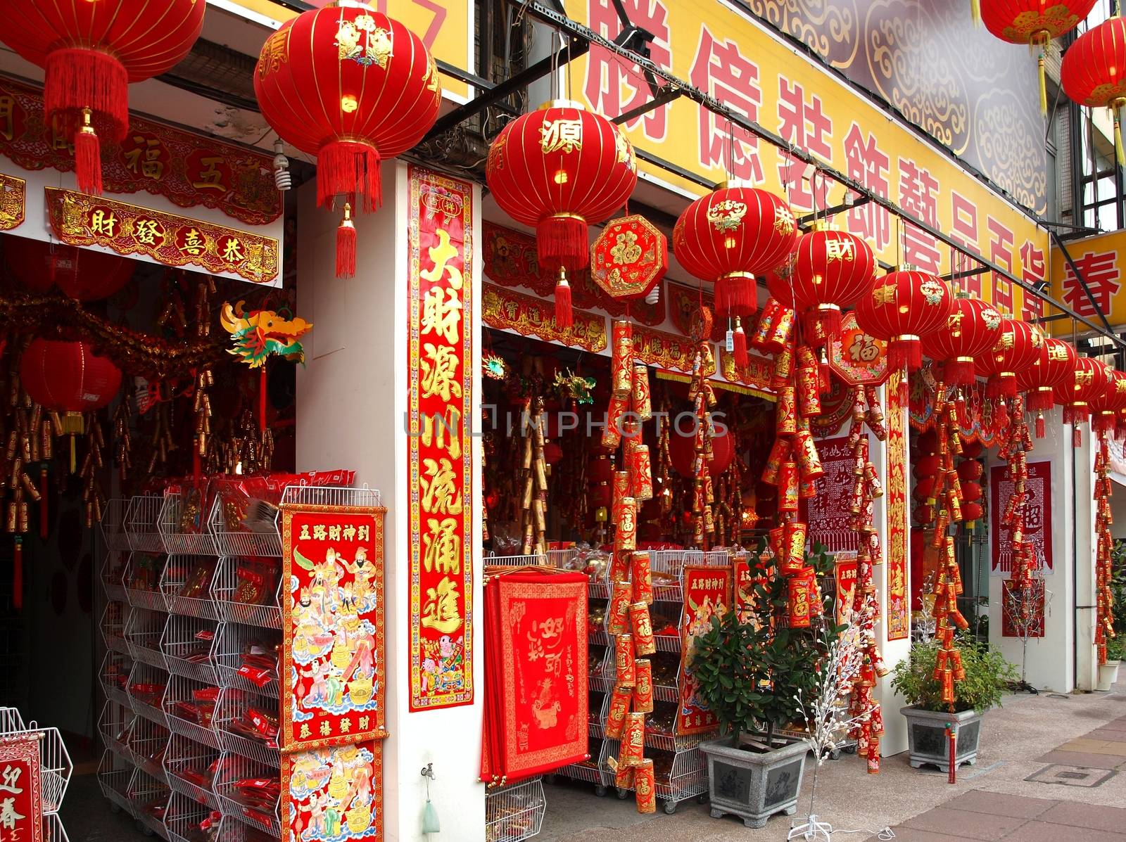 KAOHSIUNG, TAIWAN - JANUARY 22: With Chinese New Year approaching stores sell New Year decorations. This store offers lanterns, firecrackers, posters and other designs on January 22, 2013 in Kaohsiung.