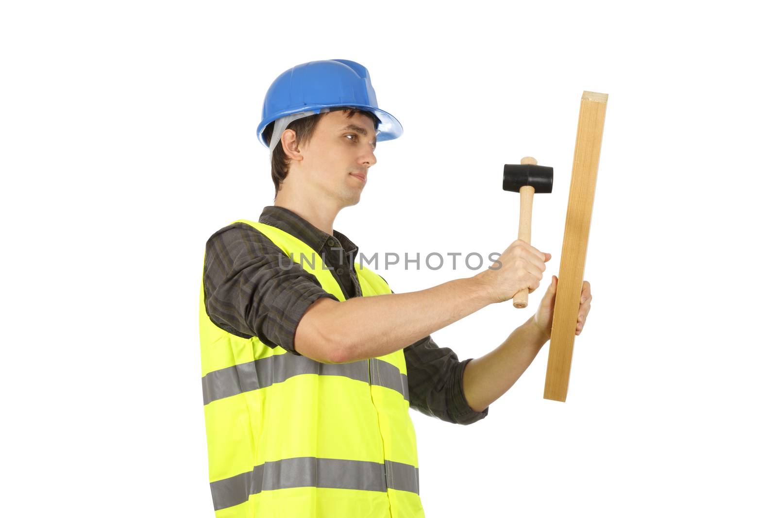 Worker man using the hammer with a plank.