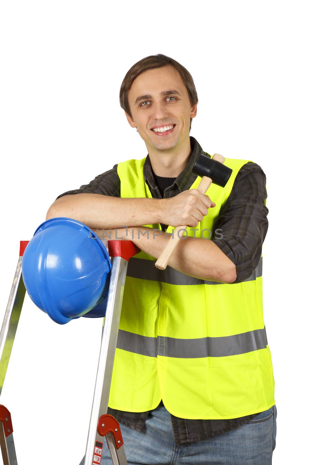 Smiling worker man with hammer and helment. Isolated on white.