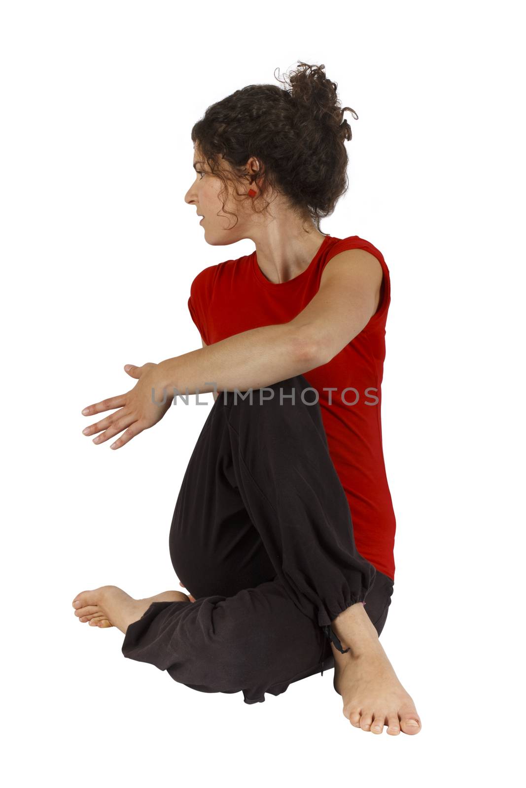 Young woman doing some exercise on floor.