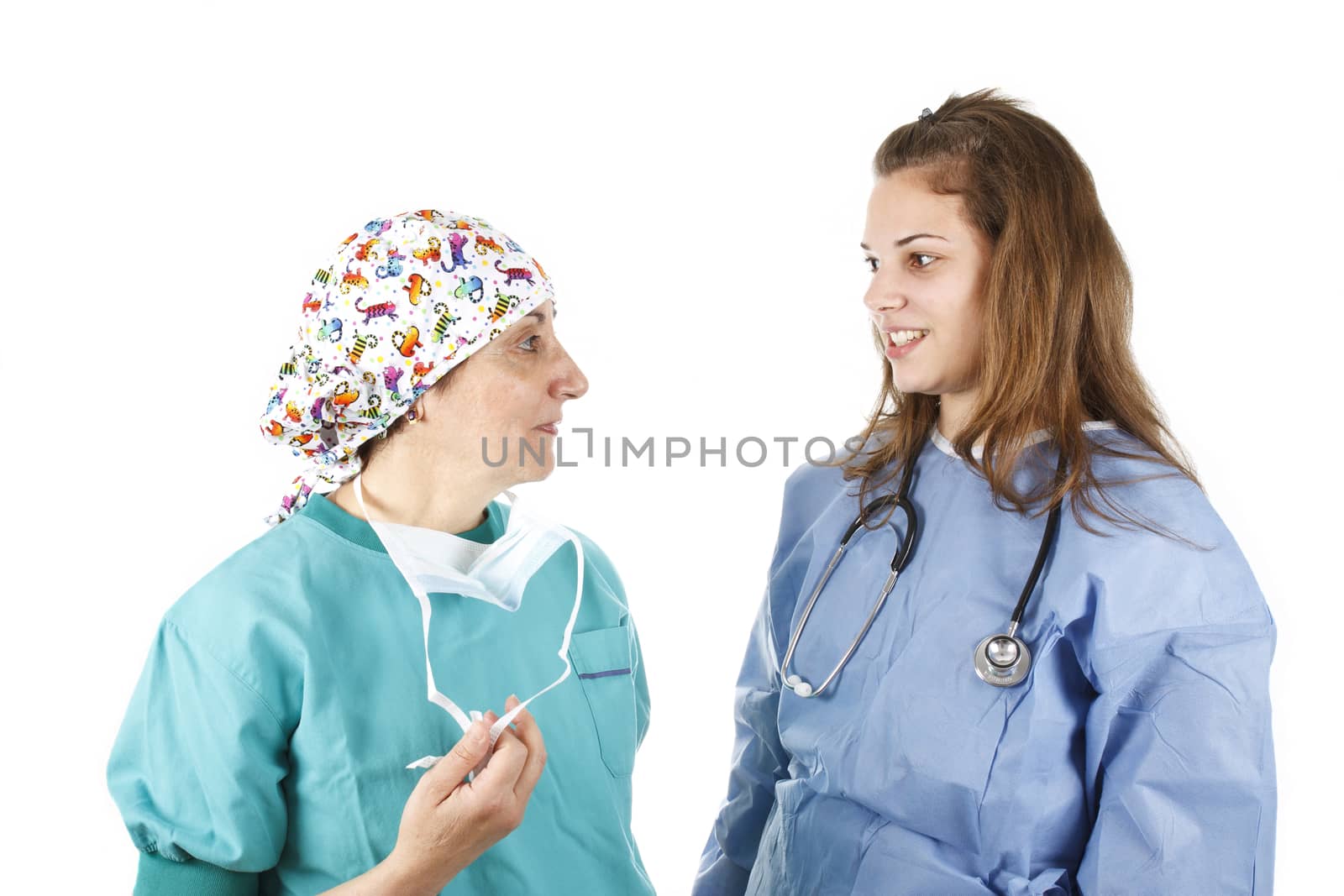 Surgeon and doctor speaking to each other. Isolated on white background.