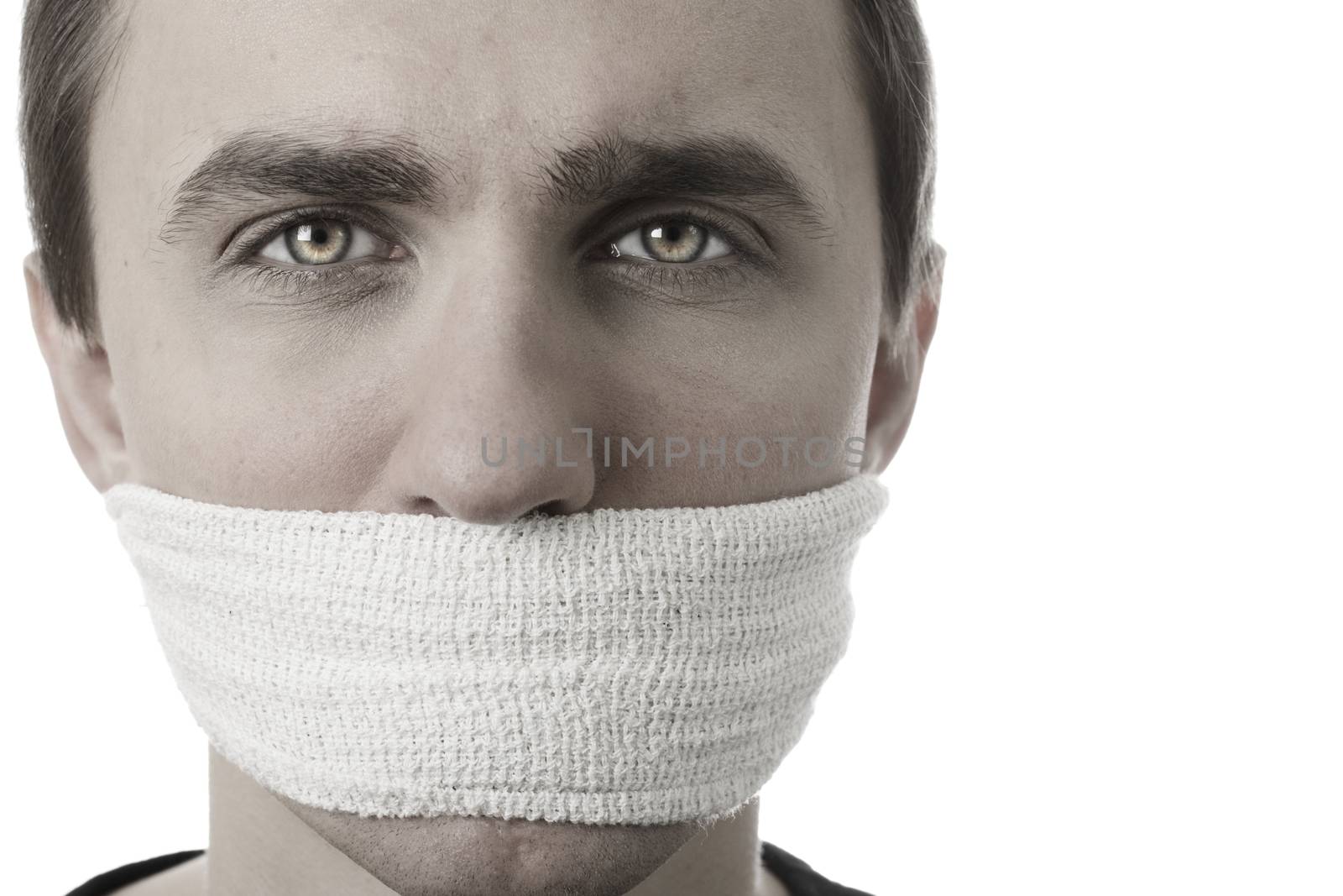 Young man with bandage covering his mouth. Isolated on white background.