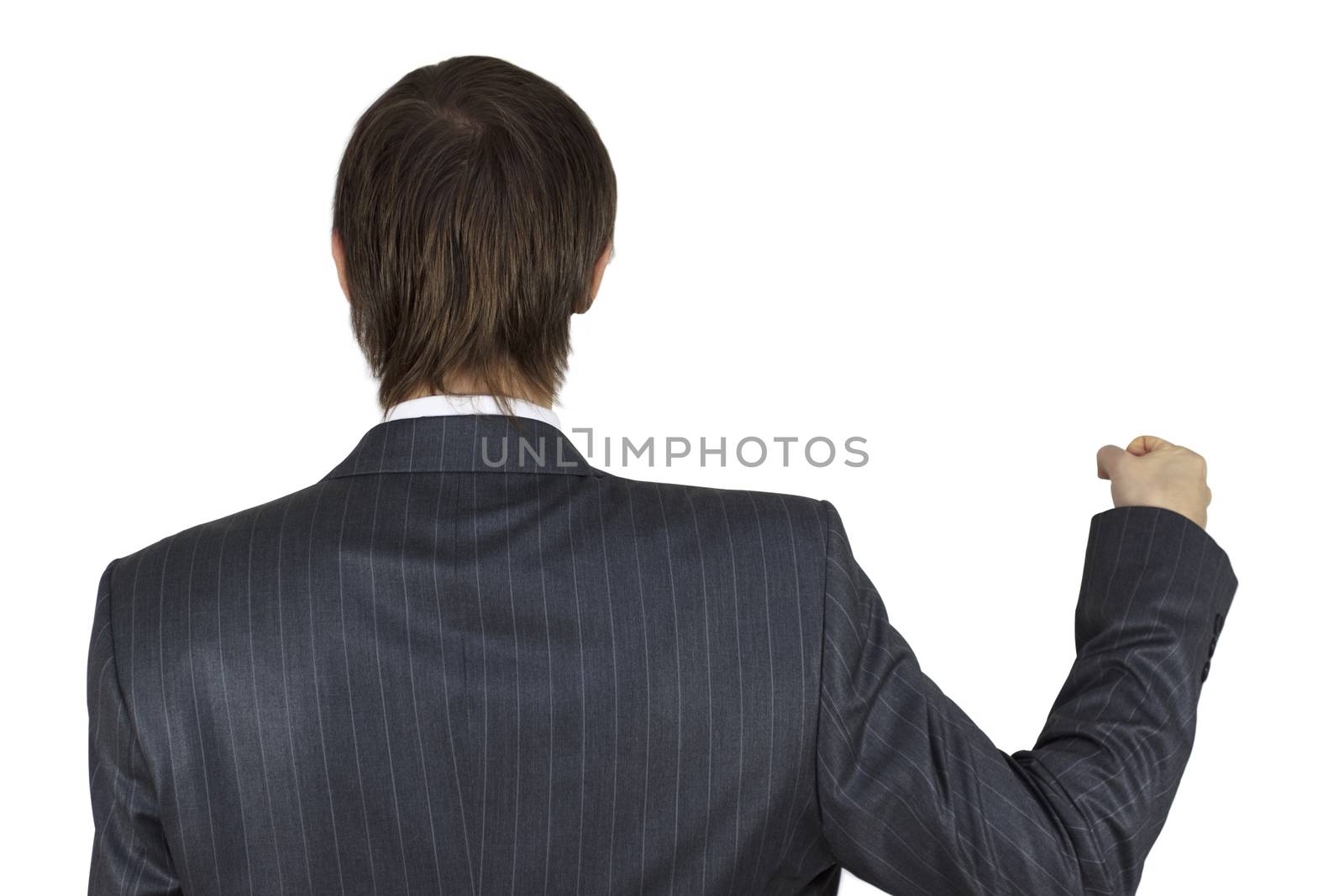 Businessman holding up from back an imaginary poster isolated on white background.