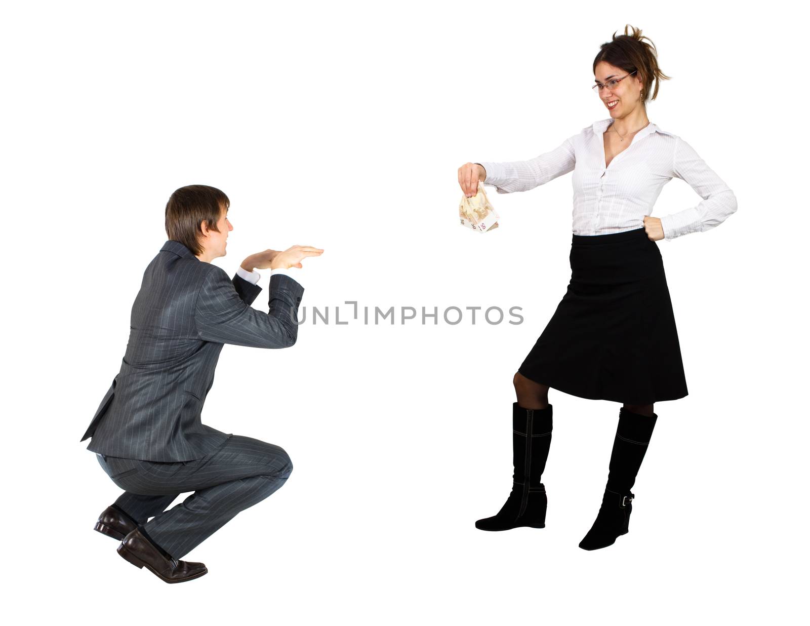 Young business woman feeding a business man like if he was a dog.