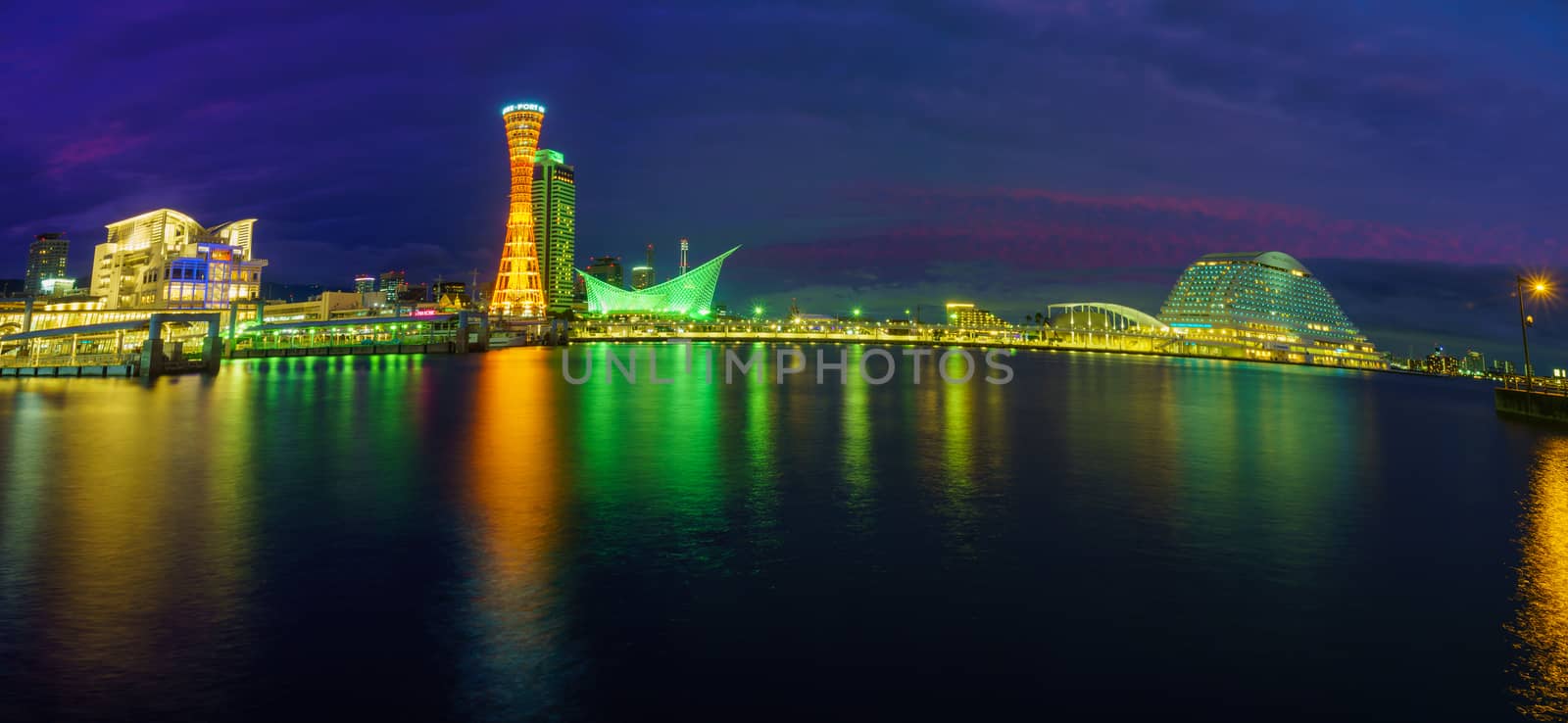 Kobe, Japan - October 11, 2019: Panoramic view of the Port at evening, with the Kobe Port Tower and other landmarks, in Kobe, Japan