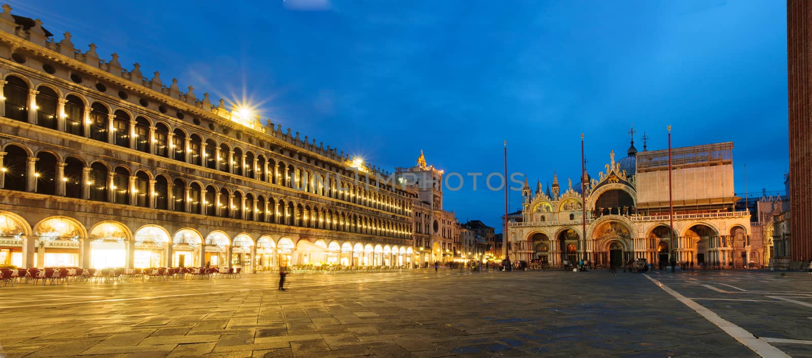 VENICE, ITALY - FEB 04, 2015: Night scene of the Piazza San Marco, with local and tourists, in Venice, Veneto, Italy