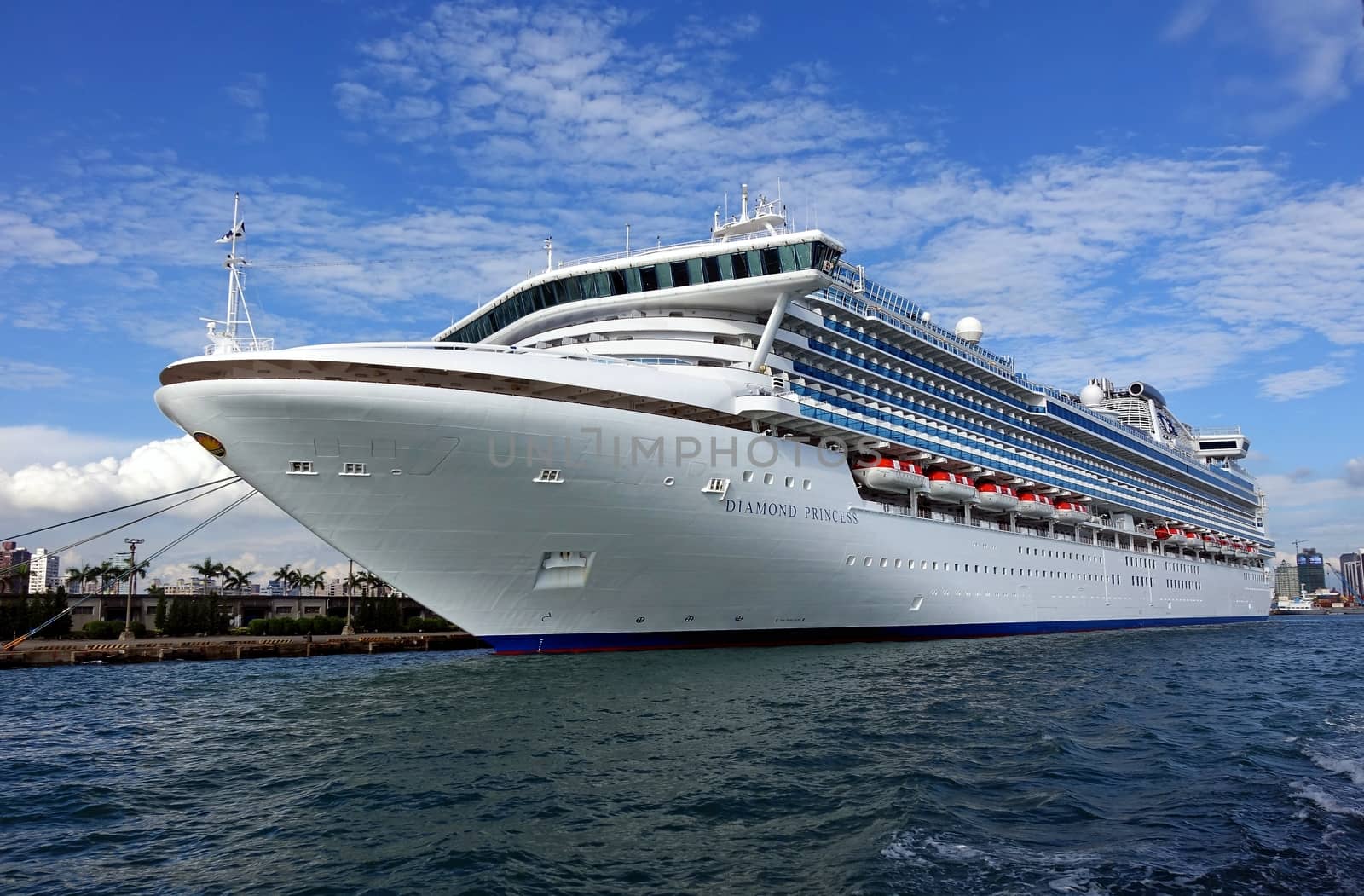 KAOHSIUNG, TAIWAN -- MAY 11, 2014:  The gem class cruise ship Diamond Princess with more than 2000 passengers on board docks at Kaohsiung Harbor.