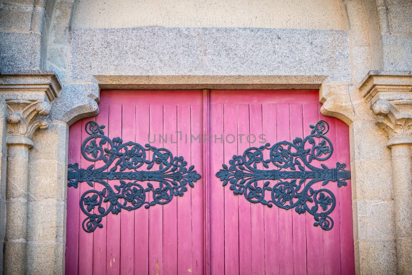 detail of the wooden door of Saint Jean-Baptiste Church in Montaigu, France