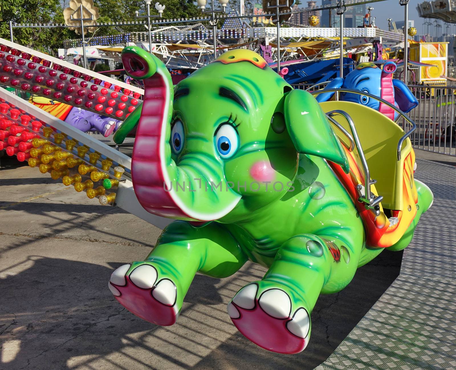 KAOHSIUNG, TAIWAN -- JANUARY 11, 2020: A children friendly carousel ride with animal shaped carriages at a local amusement park