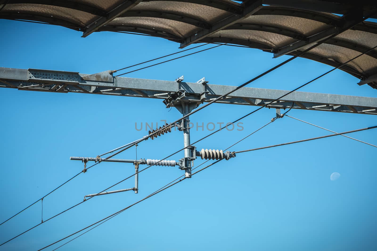 closeup of a catenary on a background of blue sky in France