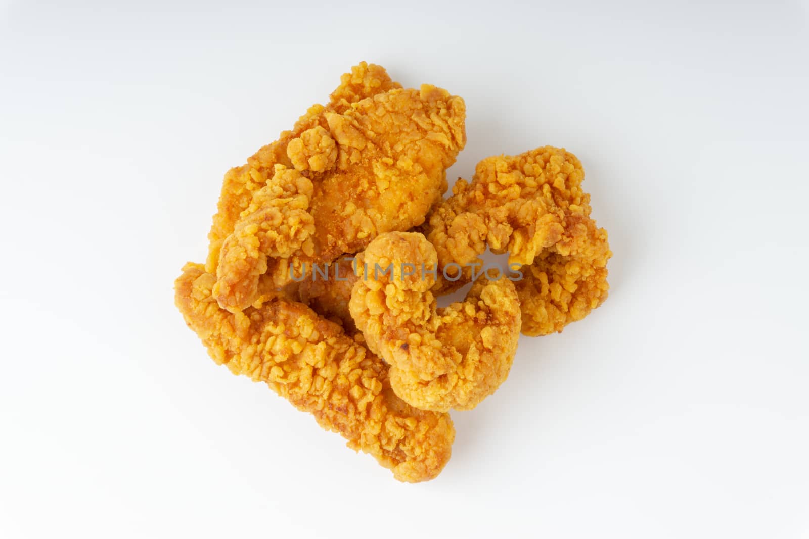 Fried breaded chicken fillet isolated on white background  by silverwings