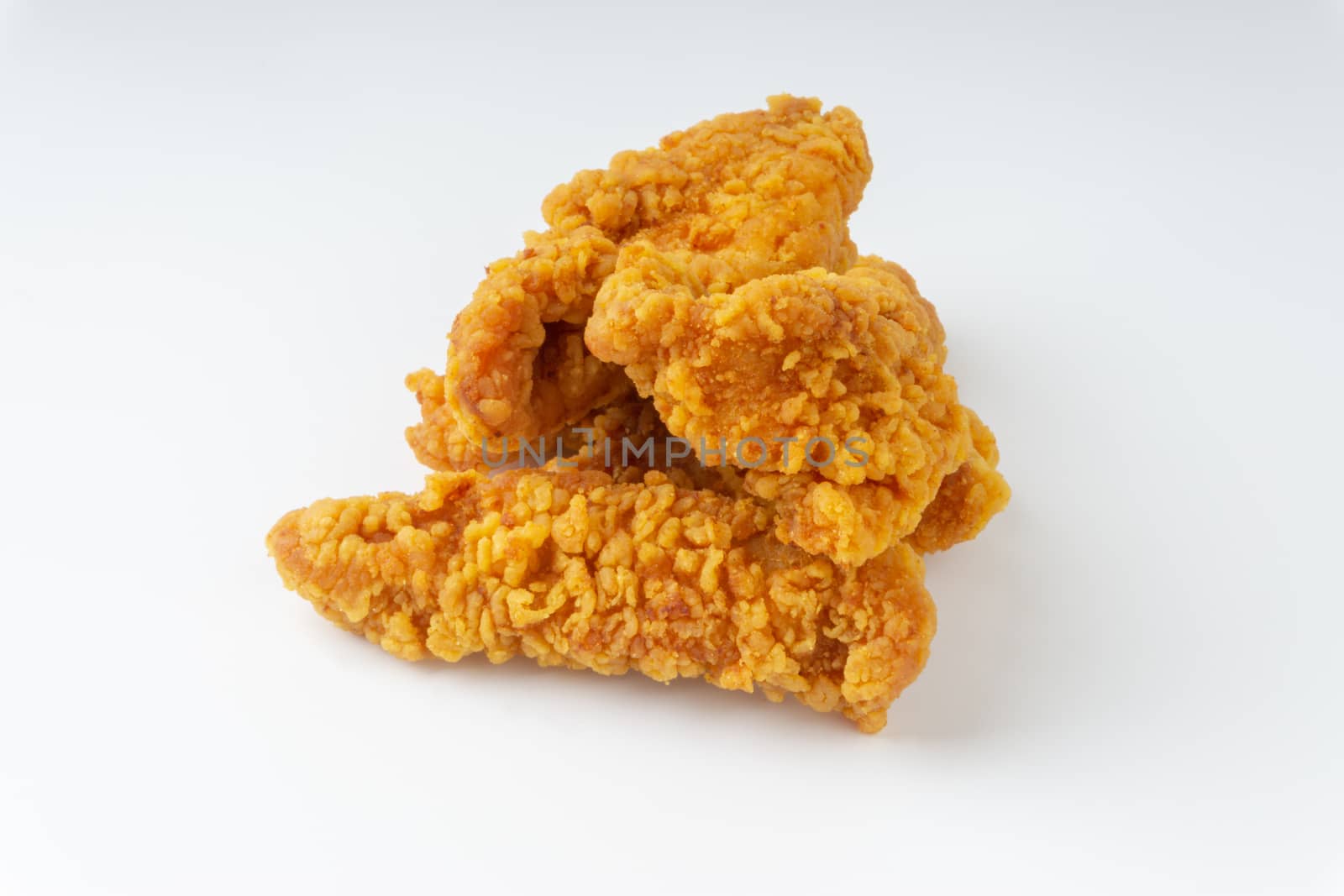 Fried breaded chicken fillet isolated on white background  by silverwings