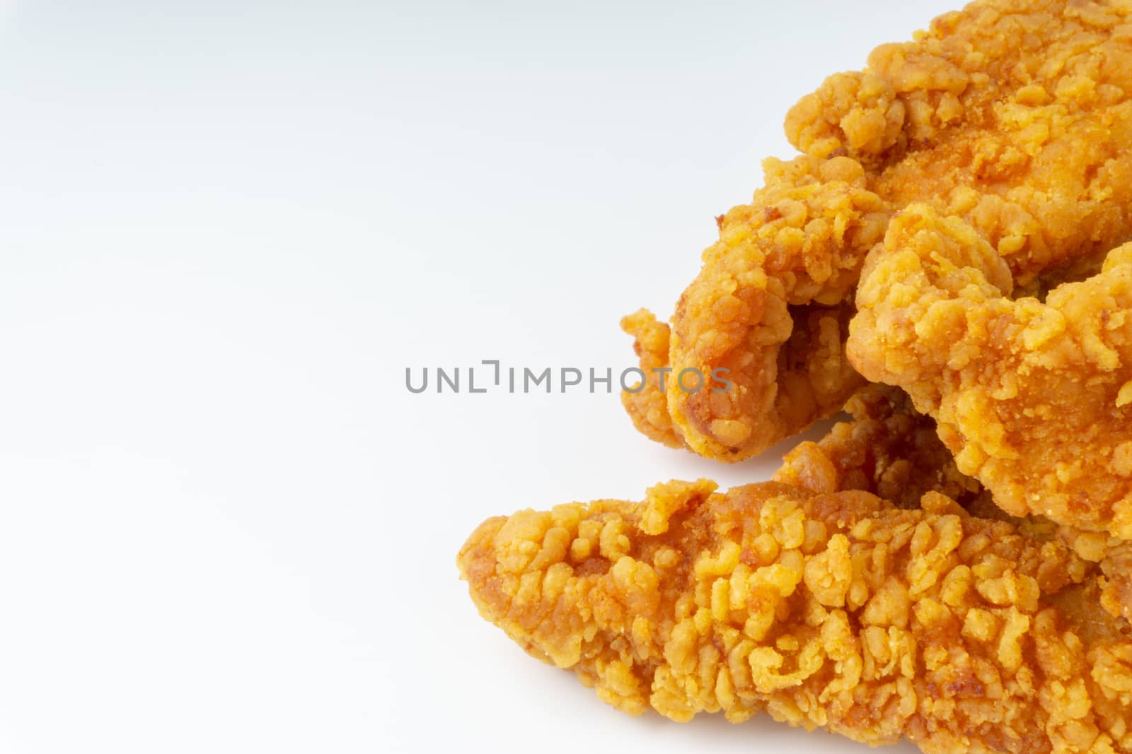 Fried breaded chicken fillet isolated on white background  by silverwings