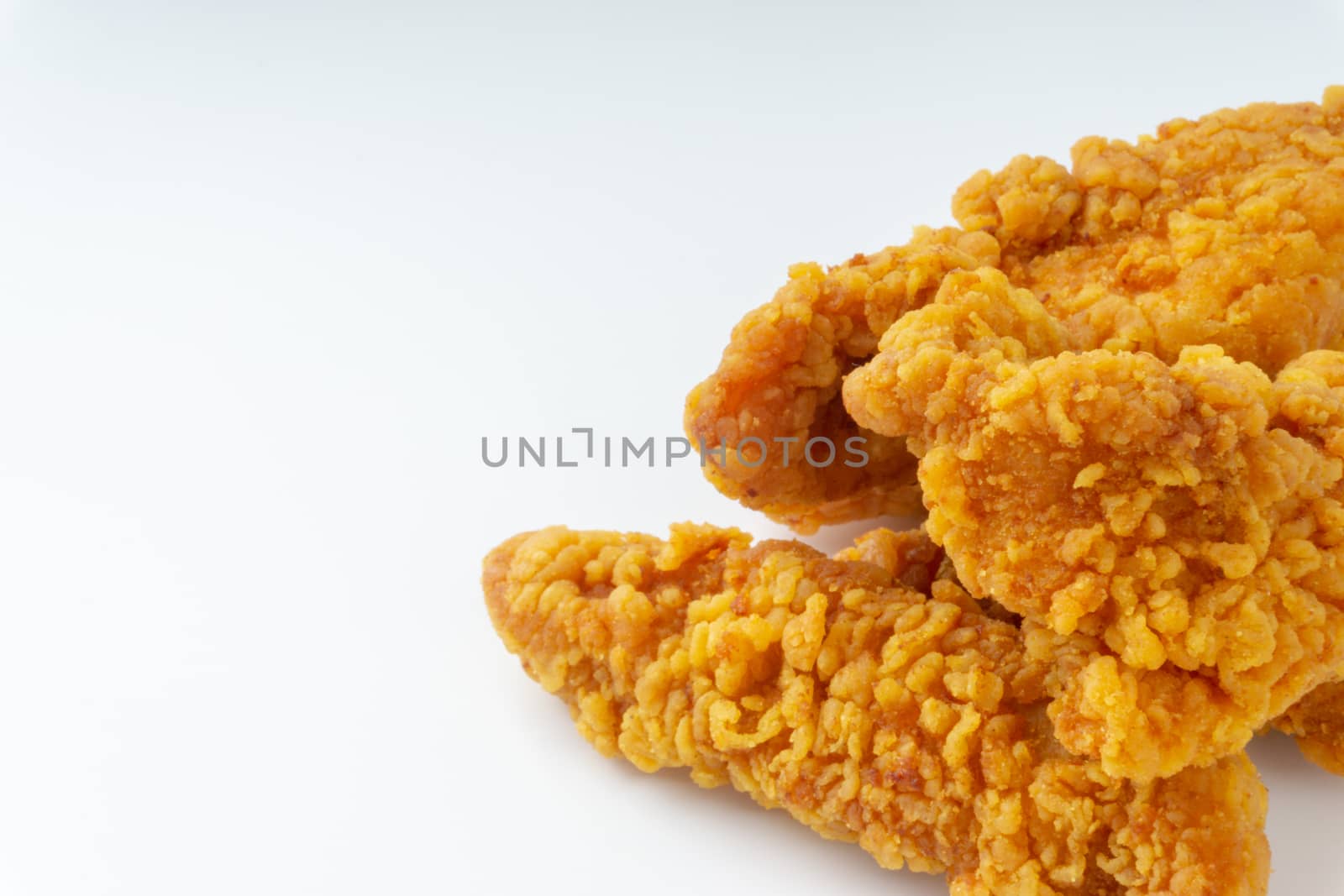 Fried breaded chicken fillet isolated on white background  by silverwings