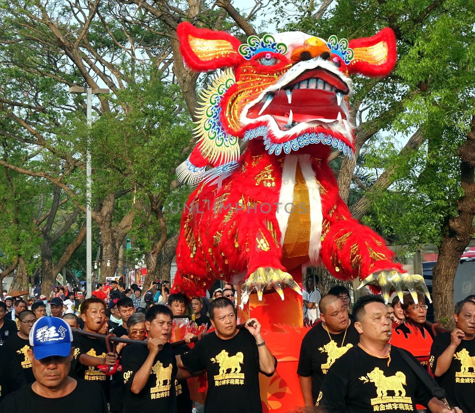 KAOHSIUNG, TAIWAN -- OCTOBER 15, 2016: The religious procession with the Fire Lion effigy is an integral feature of the yearly Wannian Festival.