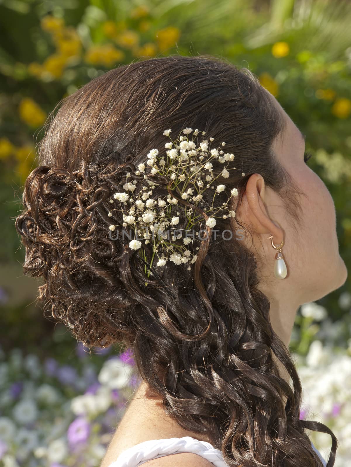 Ornate hair style with decoration on the head of a bride