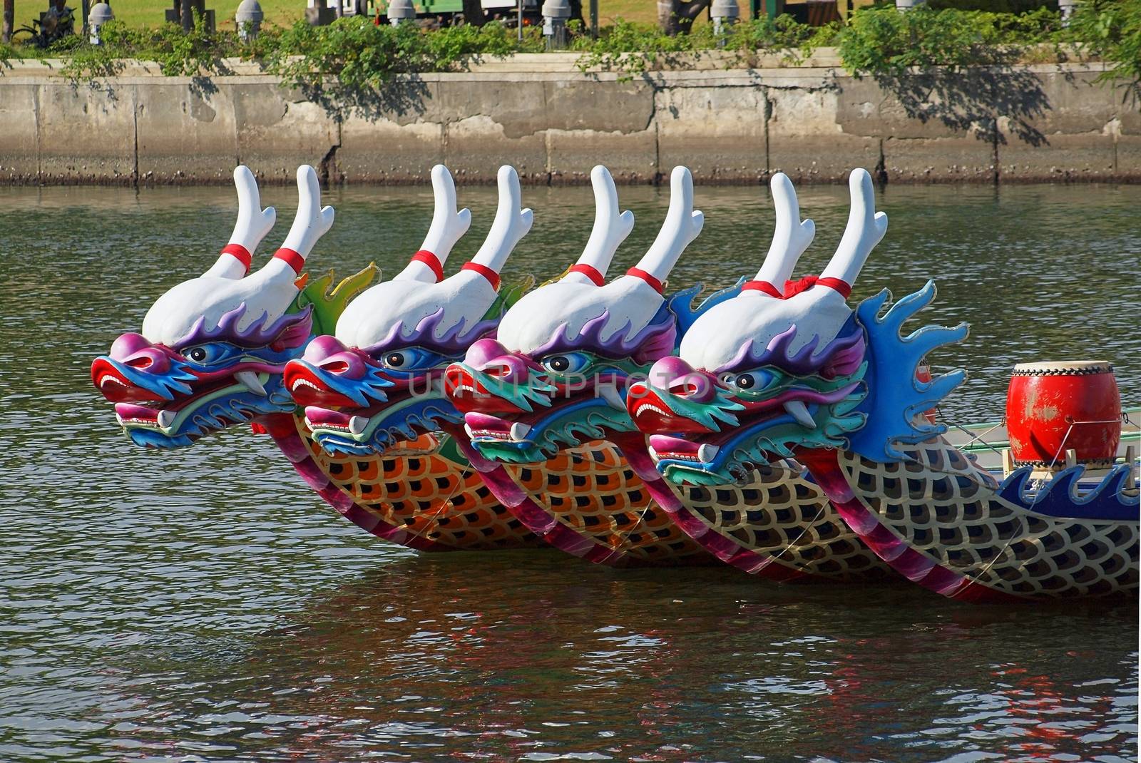 KAOHSIUNG, TAIWAN - JUNE 11: Decorated dragon boats on the Love River in Kaohsiung are ready for the Dragon Boat Festival on June 11, 2013 in Kaohsiung