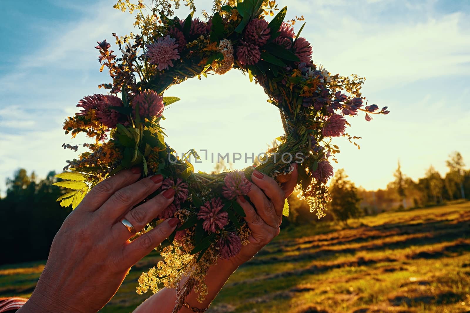 wreath of Midsummer flowers by aijaphoto