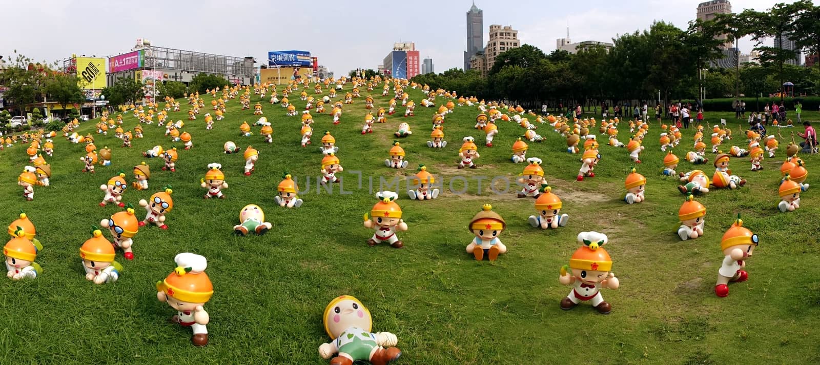 KAOHSIUNG, TAIWAN -- JUNE 28, 2014: These cute fruit wizards have been set up in a public park by the agricultural bureau to promote the sale of local farm products.