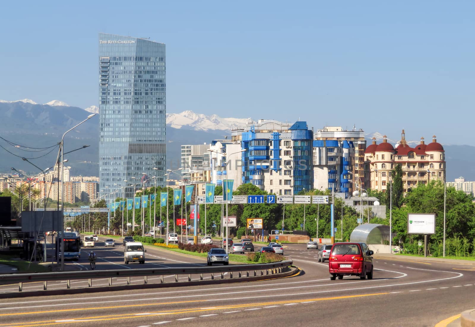ALMATY, KAZAKHSTAN - MAY 14, 2017: View from Al-Farabi avenue, it is one of the main roads in the city of Almaty

Almaty, Kazakhstan - May 14, 2017: View from Al-Farabi avenue, it is one of the main roads in the city of Almaty
