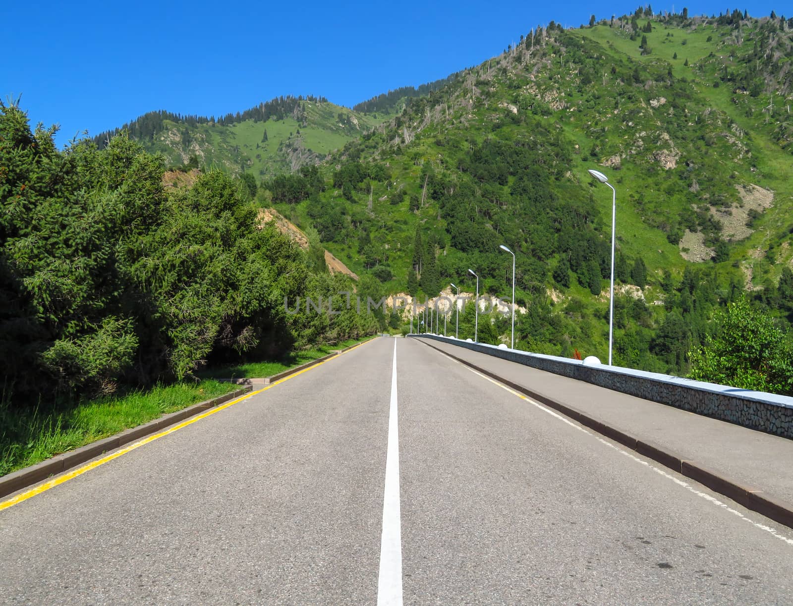 Asphalt road to Shymbulak ski resort near Almaty, Kazakhstan