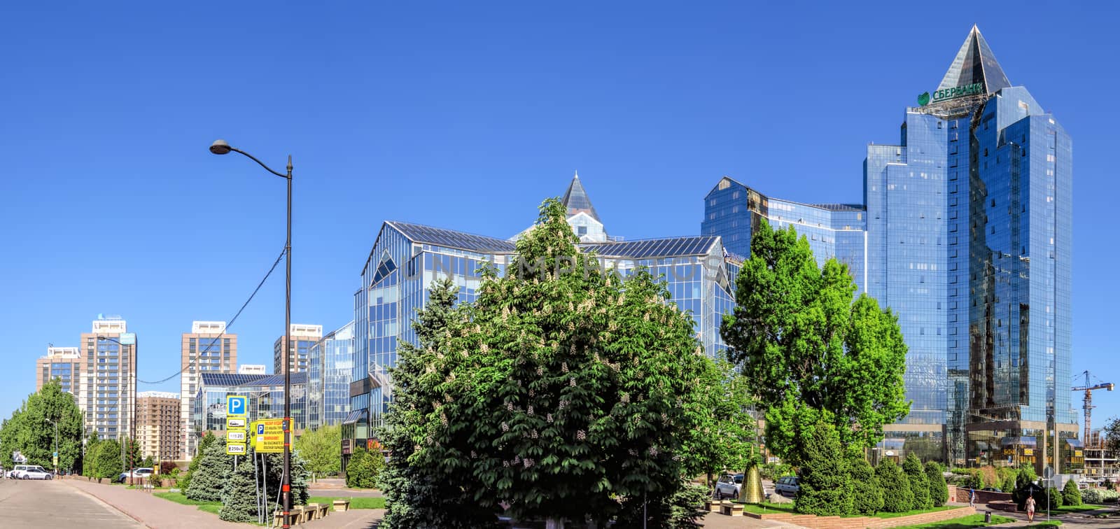 ALMATY, KAZAKHSTAN - MAY 14, 2017: Panoramic view of Business Center Nurly Tau in Almaty, Kazakhstan. Made in the style of Hi-Tech, repeating silhouettes of mountains Zailisky Alatau. Construction company - Basis A.

Almaty, Kazakhstan - May 14, 2017: Panoramic view of Business Center Nurly Tau in Almaty, Kazakhstan. Made in the style of Hi-Tech, repeating silhouettes of mountains Zailisky Alatau. Construction company - Basis A.