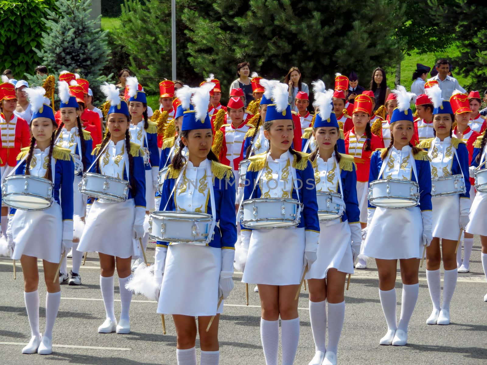 ALMATY, KAZAKHSTAN - JUNE 1, 2017: Solemn parade of children's and youth musical orchestras and ensembles on the Republic Square. More than 5,000 schoolchildren of the megapolis took part in the parade.

Almaty, Kazakhstan - June 1, 2017: Solemn parade of children's and youth musical orchestras and ensembles on the Republic Square. More than 5,000 schoolchildren of the megapolis took part in the parade.