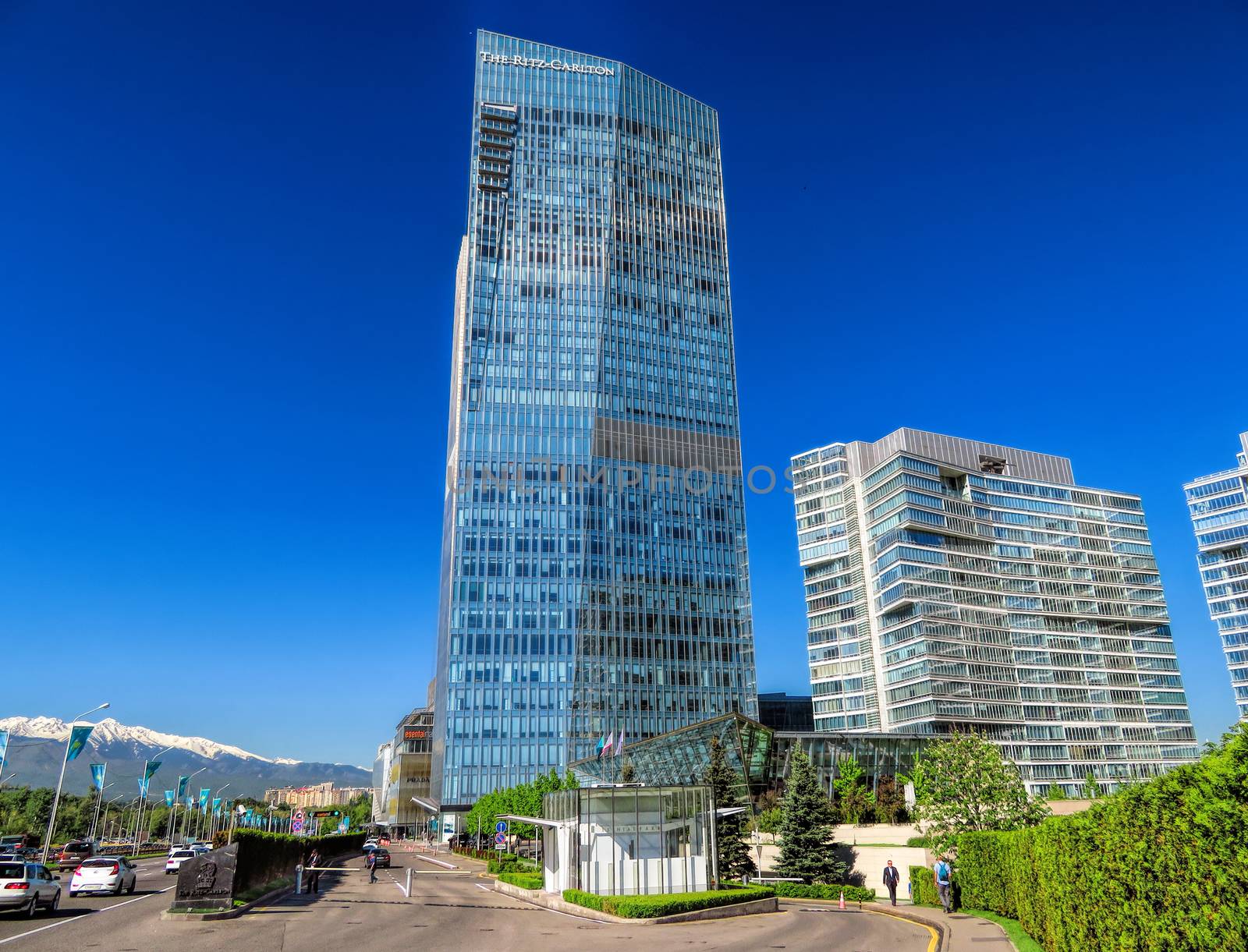 ALMATY, KAZAKHSTAN - MAY 12, 2017: The Ritz-Carlton Hotel on Al-Farabi street in Almaty, Kazakhstan. It is a complex of buildings of Business Centre of Esentai Tower.

Almaty, Kazakhstan - May 12, 2017: The Ritz-Carlton Hotel on Al-Farabi street in Almaty, Kazakhstan. It is a complex of buildings of Business Centre of Esentai Tower.