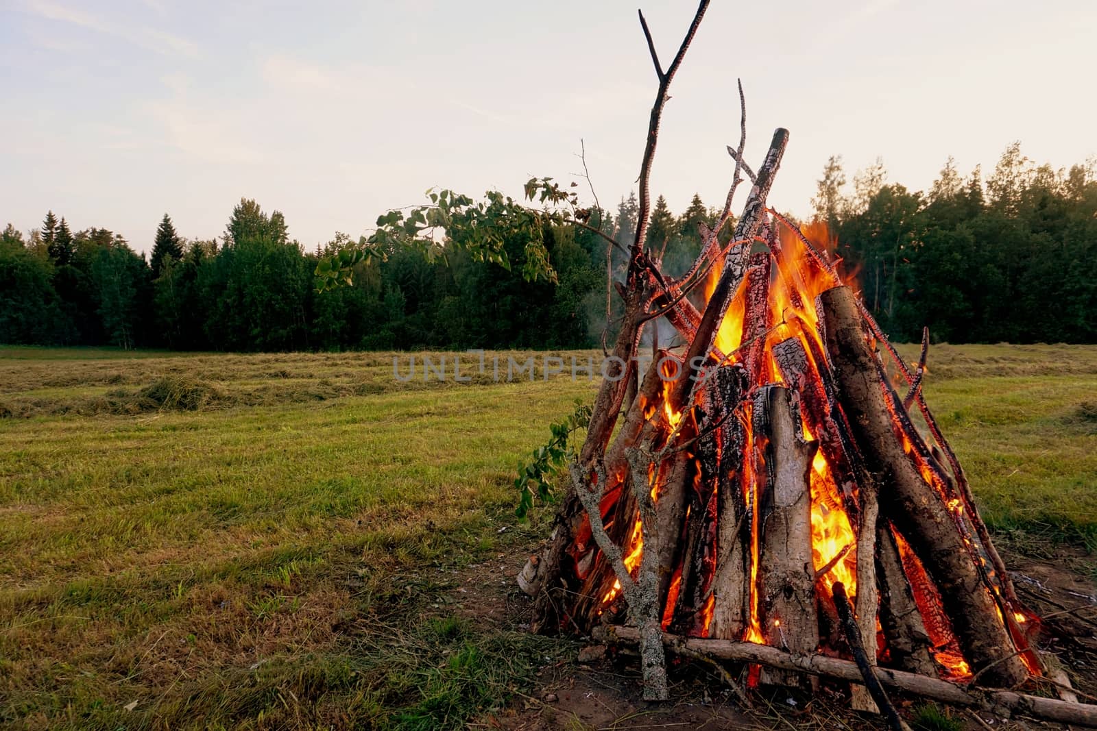 Midsummer bonfire by aijaphoto