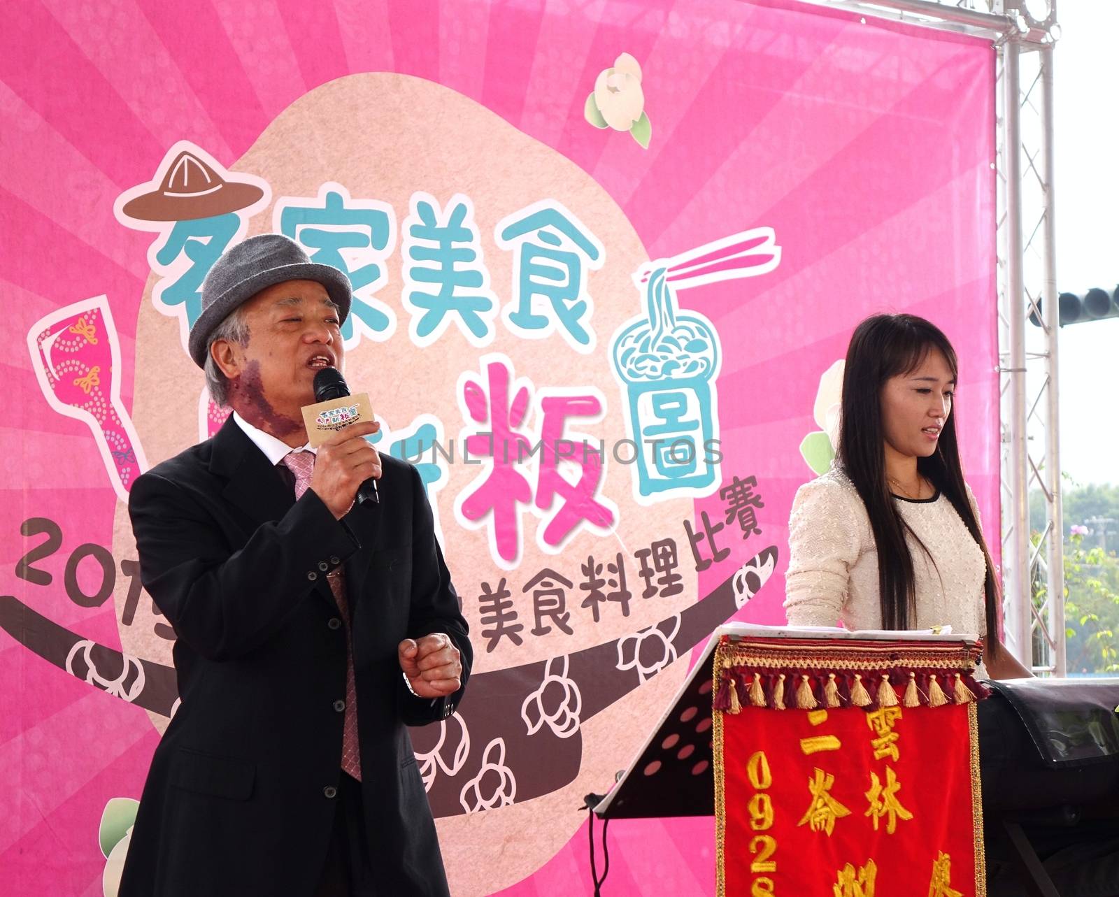 KAOHSIUNG, TAIWAN -- NOVEMBER 28, 2015: Two unidentified local musicians perform at the 2015 Hakka Food Festival, which is a yearly public outdoor event.
