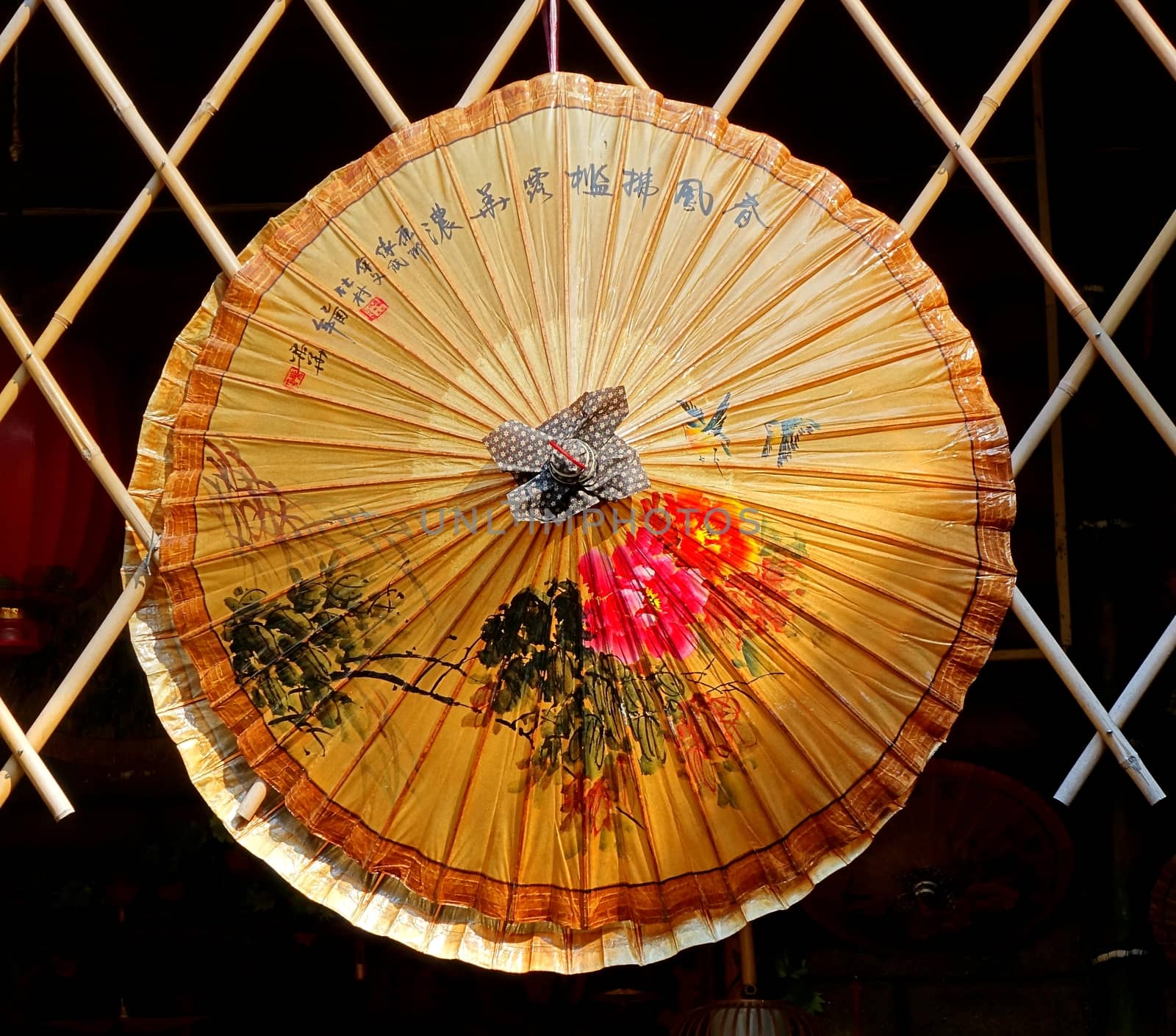KAOHSIUNG, TAIWAN -- JULY 24, 2016: A hand-painted oil-paper umbrella, which is a traditional art and craft product by the Chinese Hakka people.