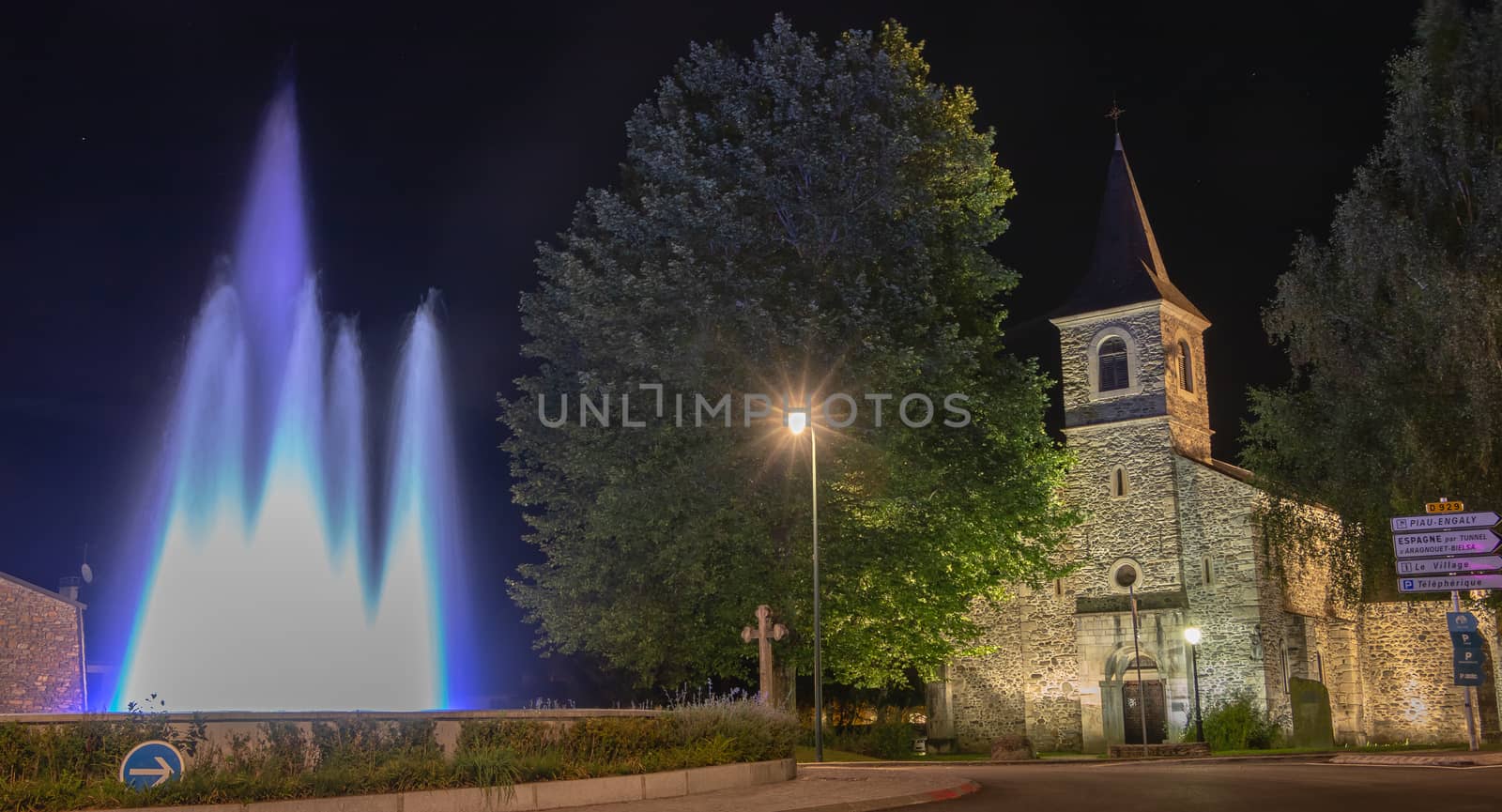 Saint Lary Soulan, France - August 21, 2018: Architecture detail of the Sainte Marie chapel by night on a summer day