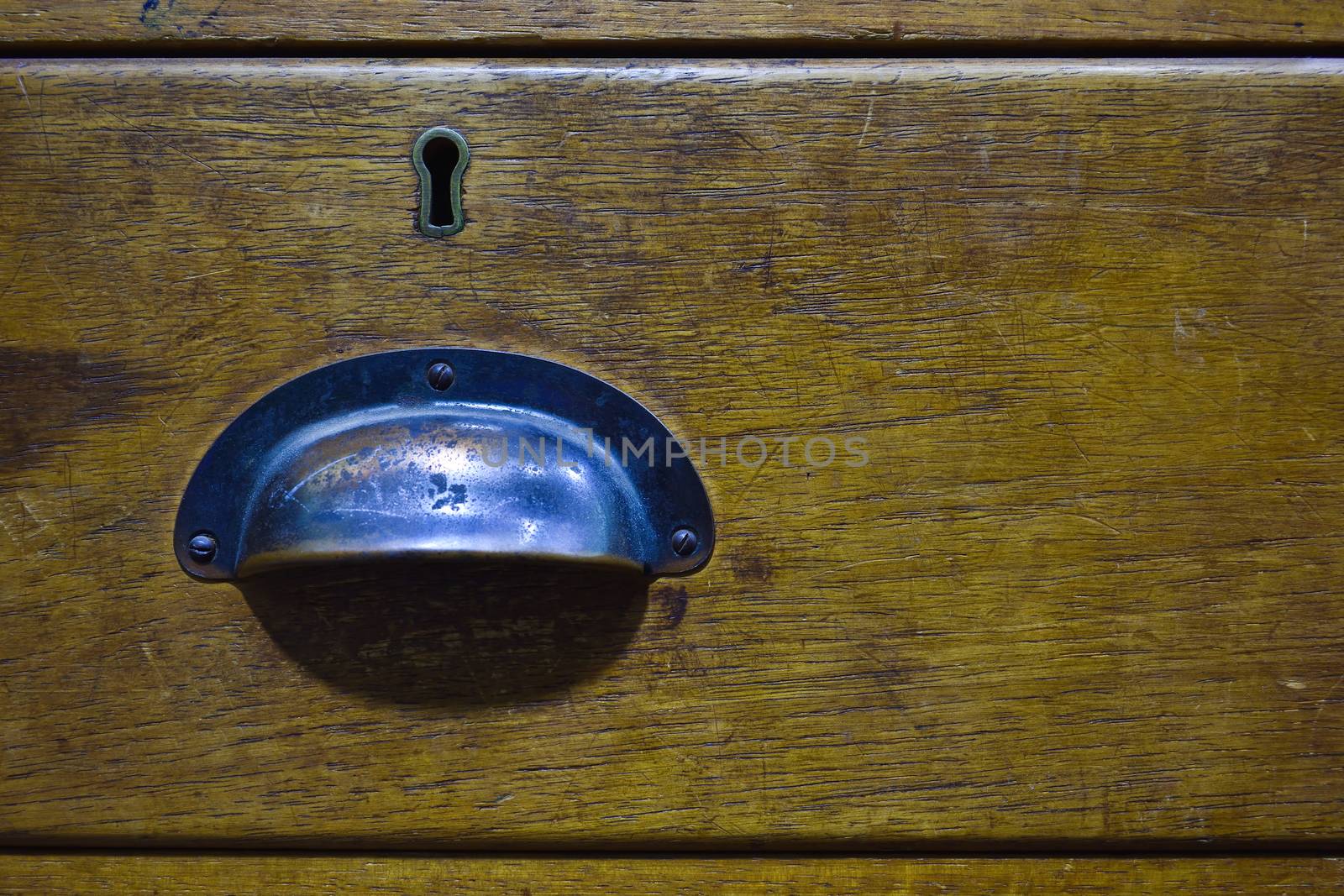 Closed Antique Wooden Desk Drawer Face by jjvanginkel