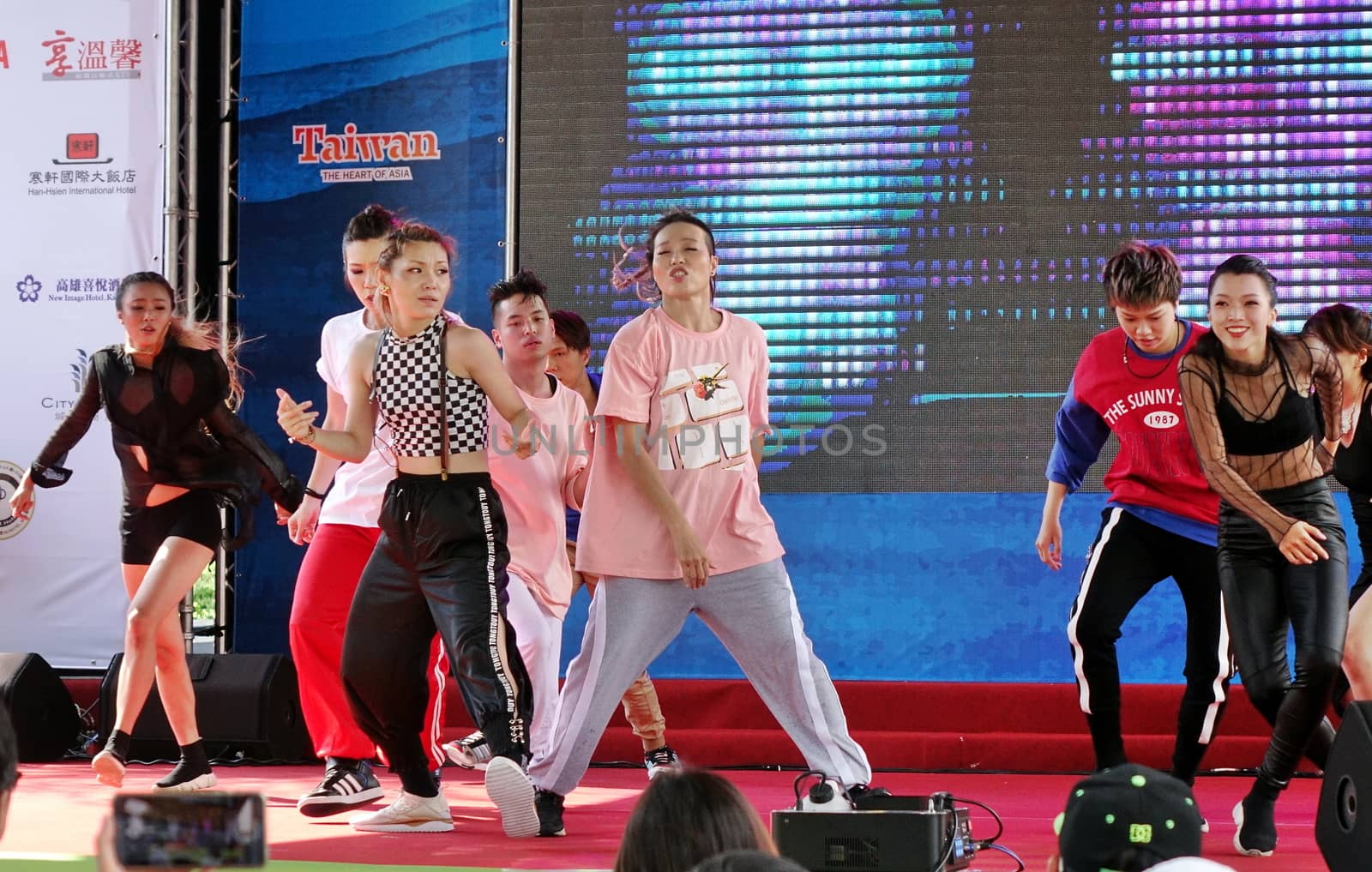 KAOHSIUNG, TAIWAN -- JUNE 30, 2018: Young people perform a hip-hop dance at the opening of the Love River Festival, a free, public outdoor event.