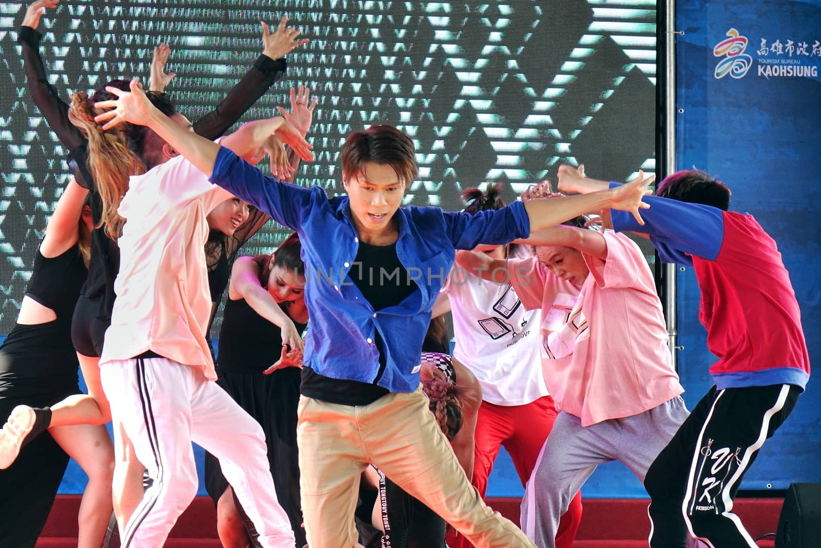 KAOHSIUNG, TAIWAN -- JUNE 30, 2018: Young people perform a hip-hop dance at the opening of the Love River Festival, a free, public outdoor event.