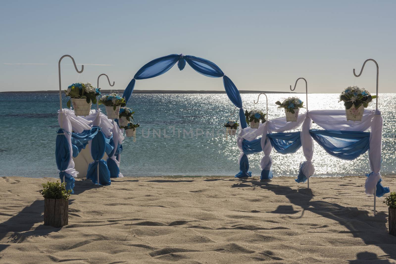 Wedding aisle setup on tropical beach by paulvinten