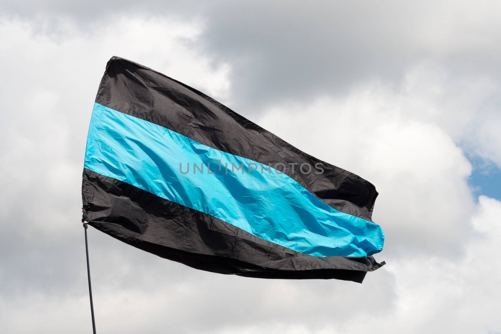 PARKER"S PIECE, CAMBRIDGE - JULY 7: flag of Team Sky cycling team taken at Tour de France Stage 3 Cambridge to London on July 7, 2014 at Parker's Piece, Cambridge, Cambridgeshire, UK.