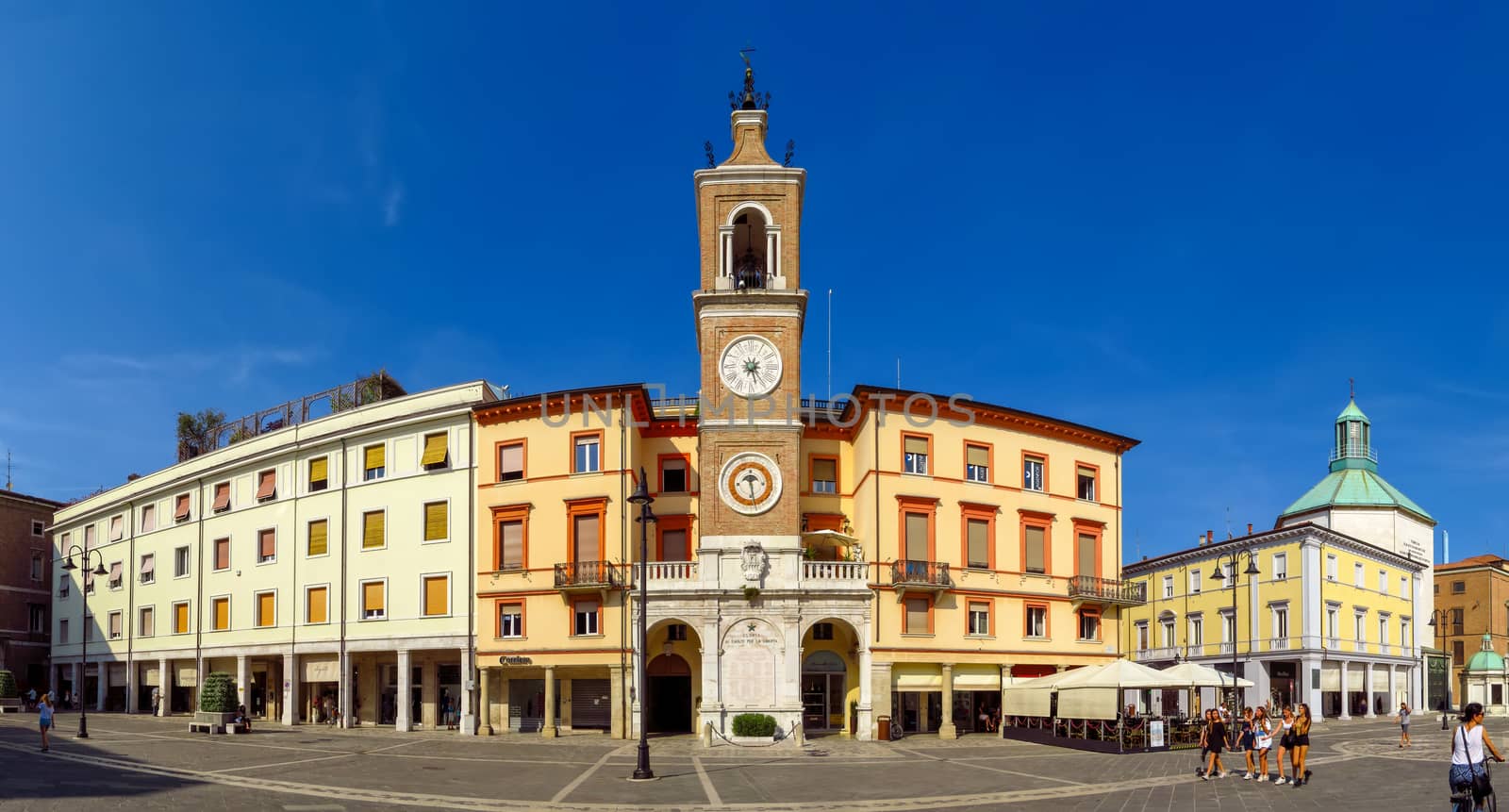 Rimini, Italy - June 21, 2017: The square Piazza tre Martiri with the ancient clock tower