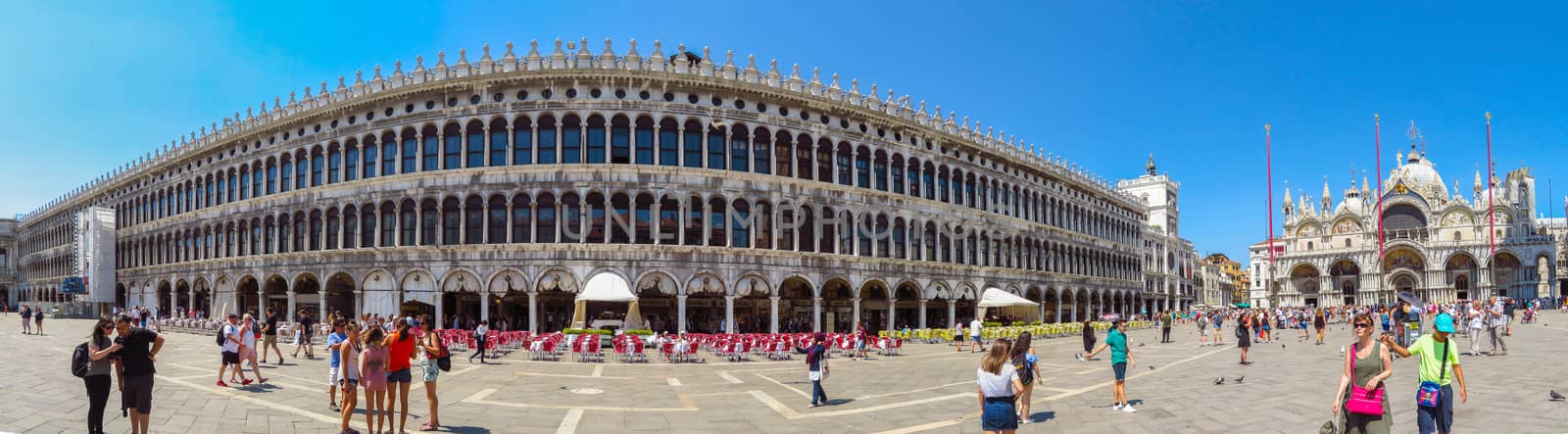 Venice, Italy - June 20, 2017: Panoramic view of a San Marco square in Venice, Italy. Thousands of tourists every month visit St Mark's Square.