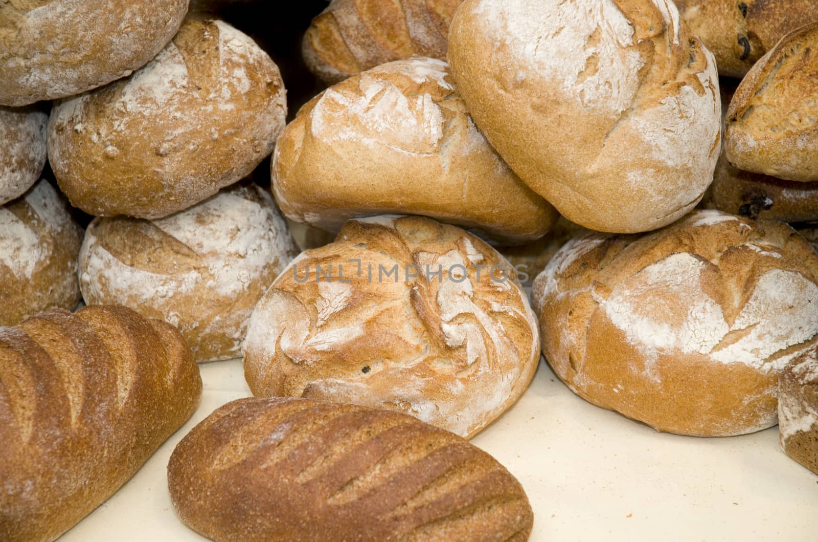 A pile of bread loaves for sale