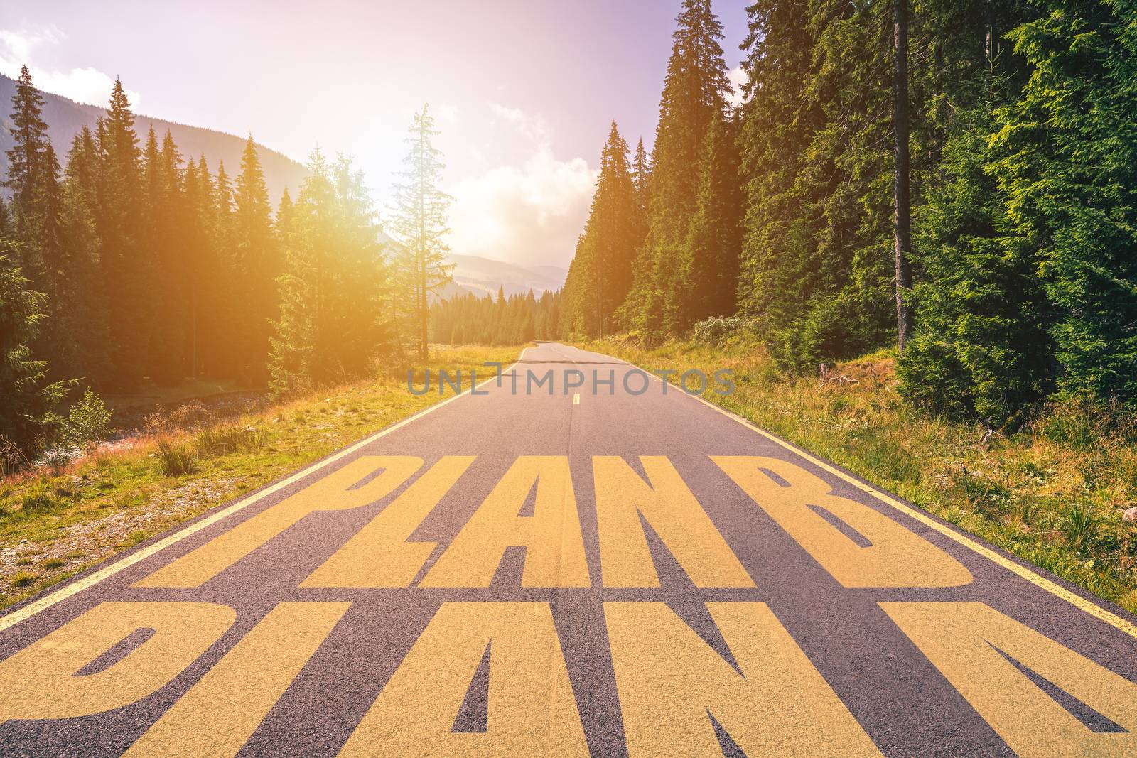 Empty asphalt road with Plan A and Plan B concept. Driving on an empty road in the mountains to the Plan B and leaving behind the Plan A. 