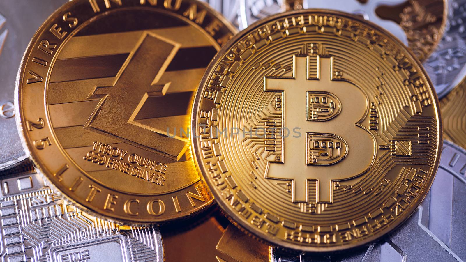 Stack of cryptocurrencies with a golden bitcoin. Bitcoin as most important cryptocurrency concept. Bitcoin. Physical bit coin. Digital currency. Cryptocurrency. Golden coin with bitcoin