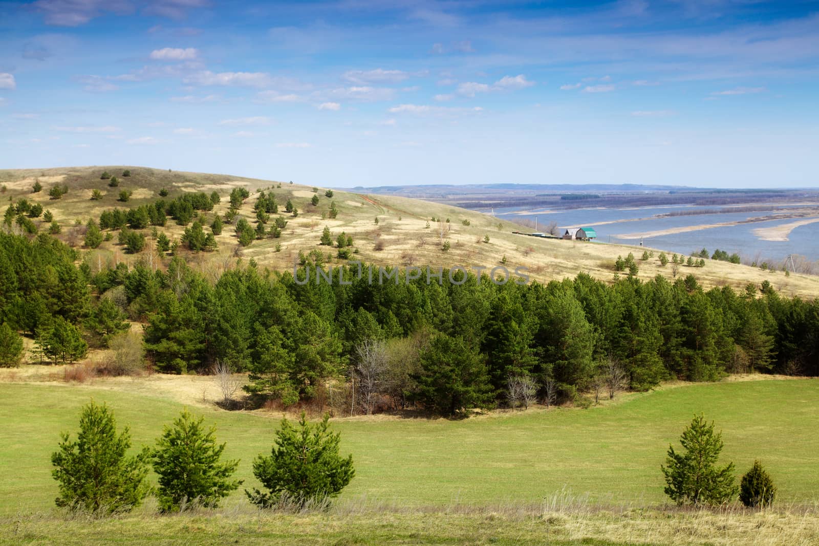 Beautiful summer landscape with green hills and blue sky.